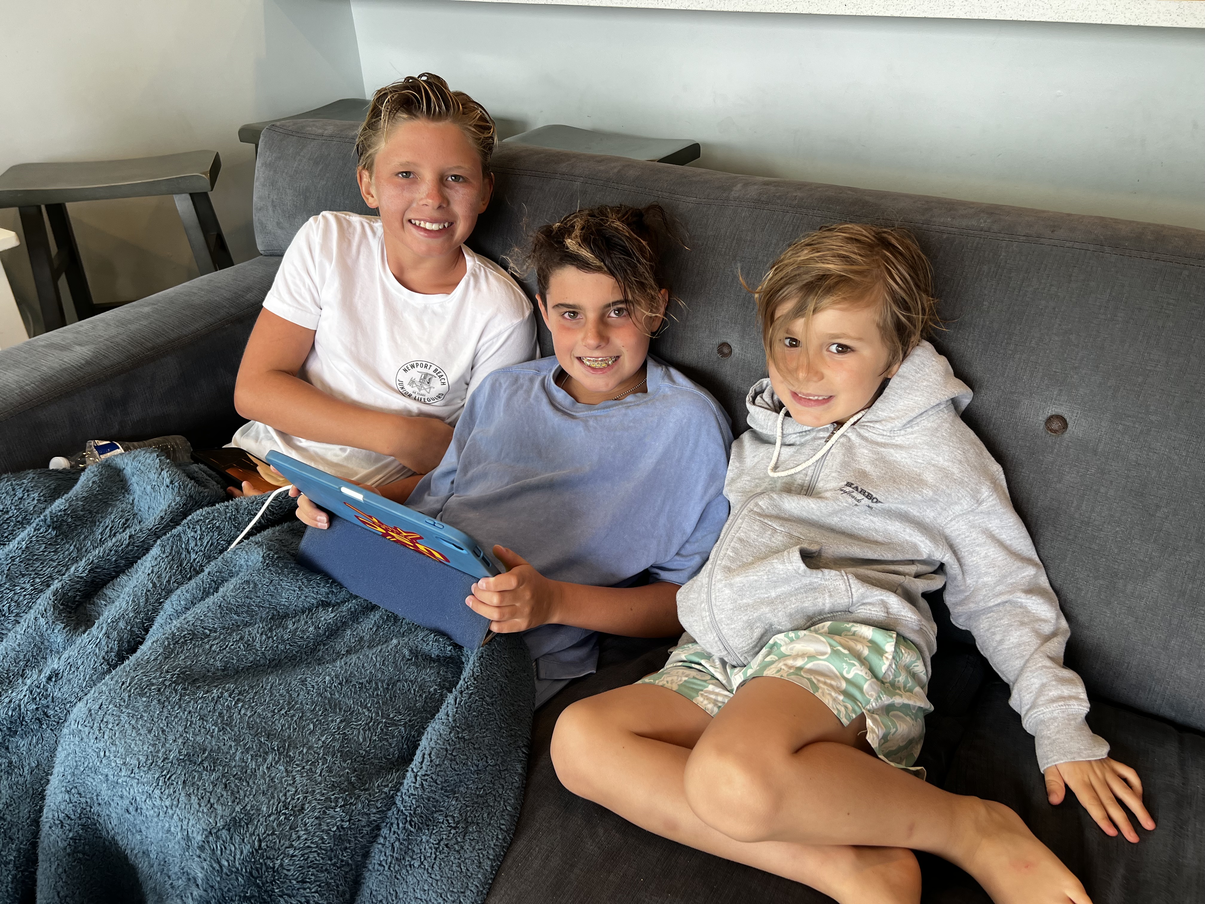 Img: people, person, couch, boy, child, male, female, girl, book, portrait