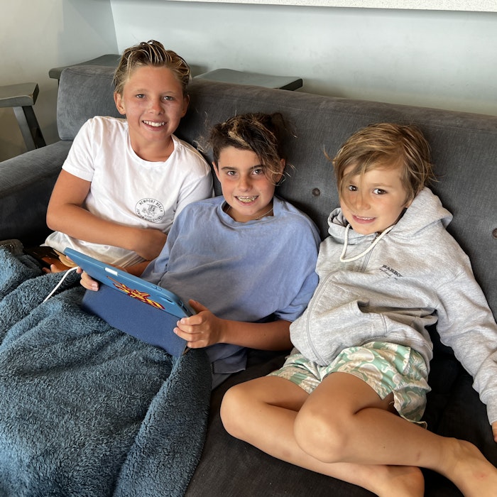 Img: people, person, couch, boy, child, male, female, girl, book, portrait