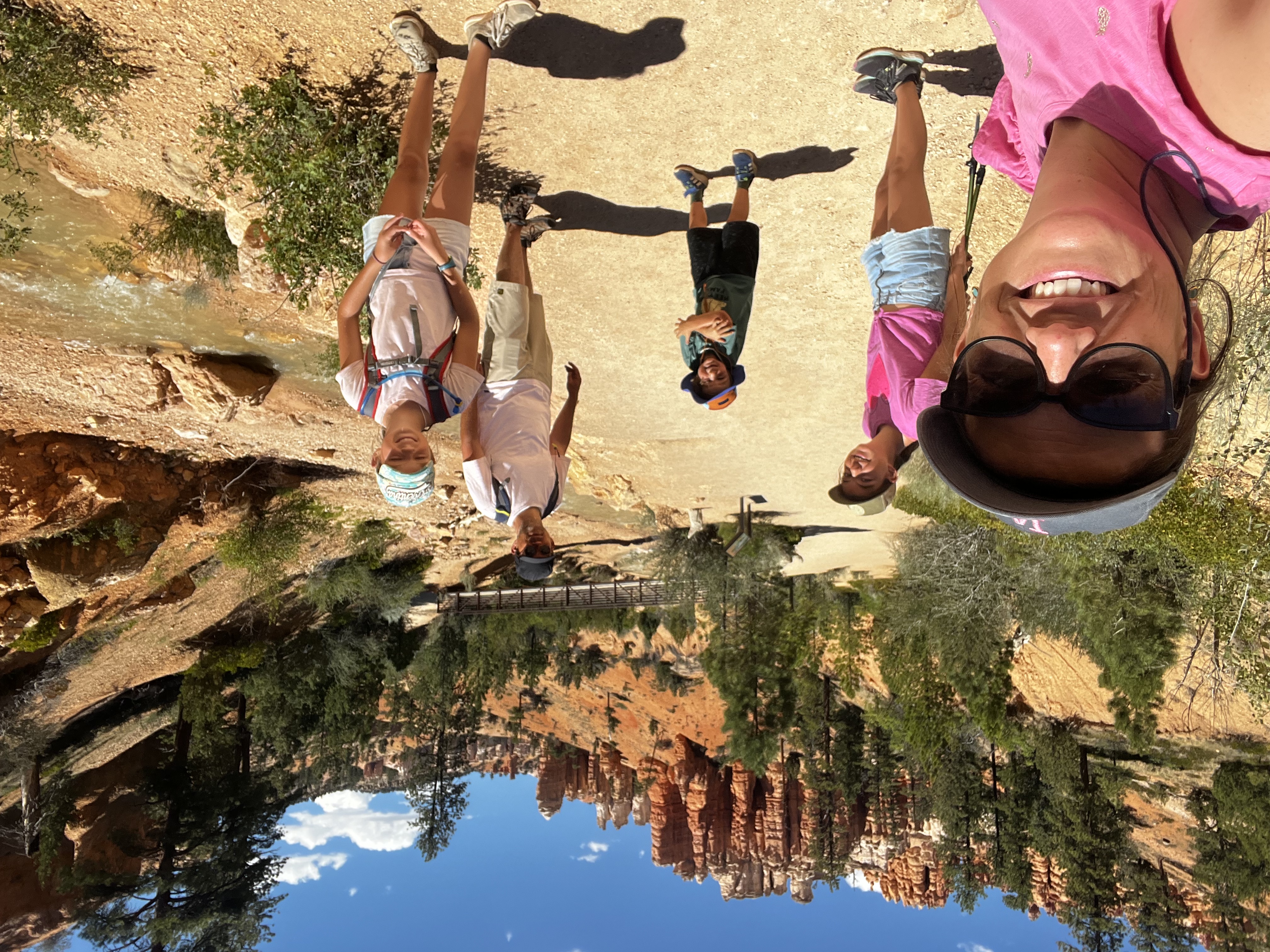Img: wilderness, hiking, person, sunglasses, rock, vegetation, shoe, hat, path, glasses