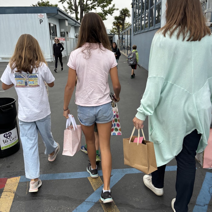 Img: person, walking, shoe, handbag, shorts, pants, child, female, girl, city