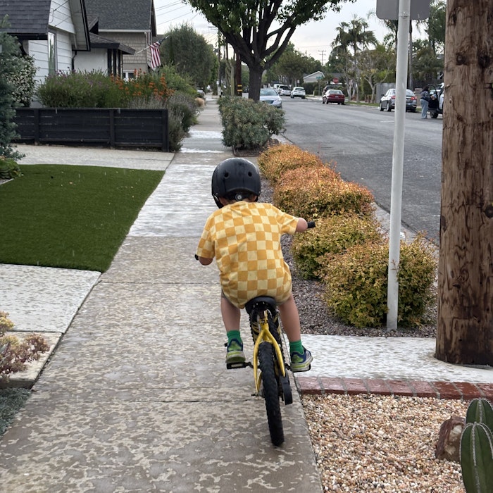 Img: helmet, city, street, path, shoe, boy, child, male, person, car