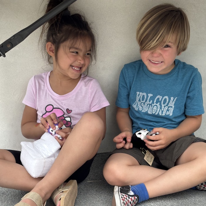 Img: t-shirt, person, photography, portrait, shorts, shoe, child, female, girl, sitting