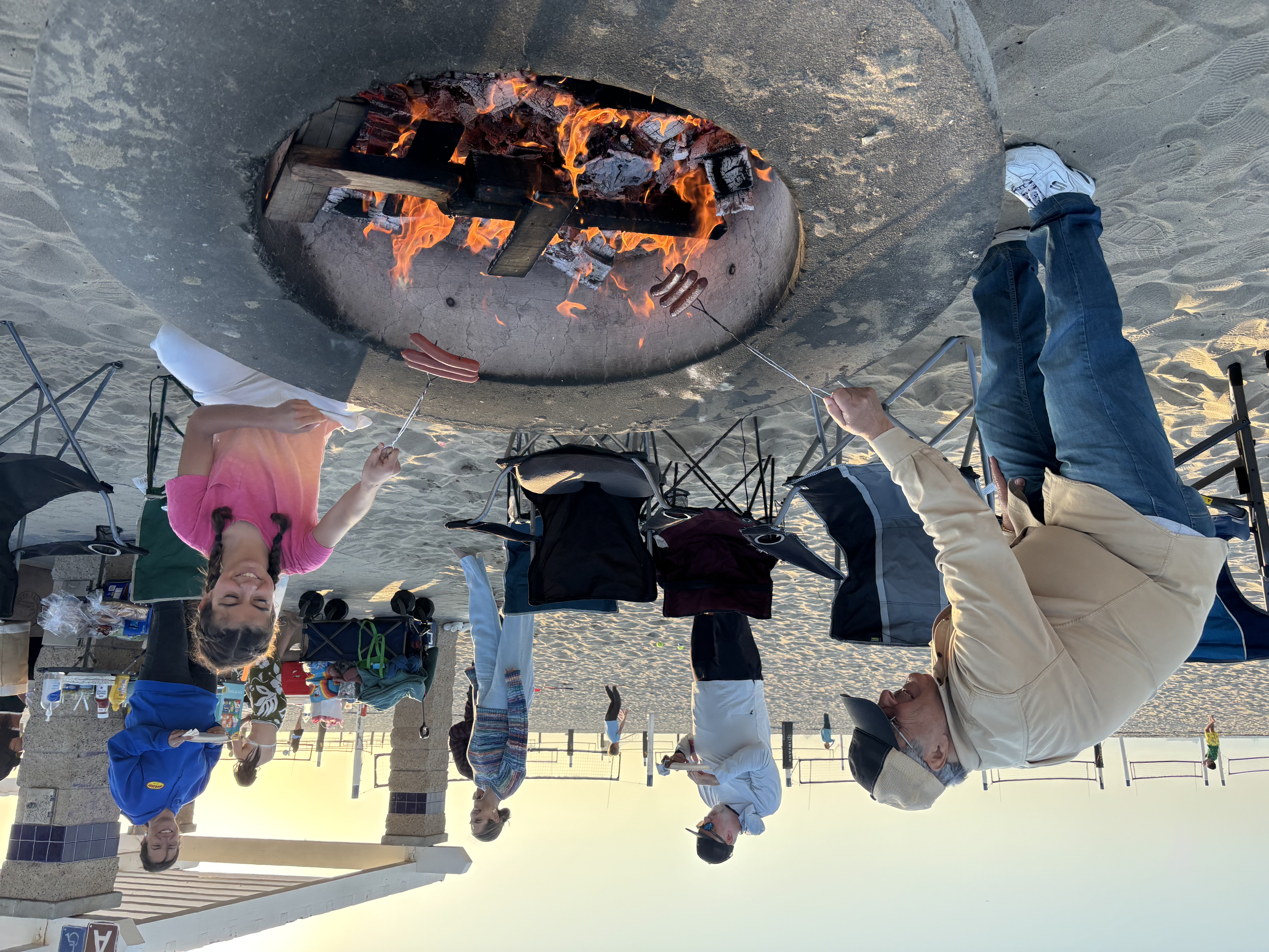 Img: shoe, hat, adult, male, man, person, chair, bbq, cooking, grilling