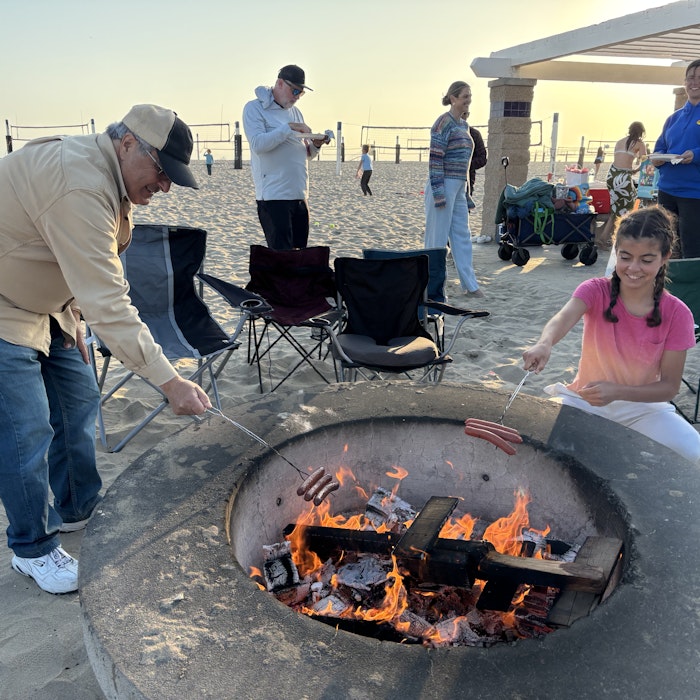 Img: shoe, hat, adult, male, man, person, chair, bbq, cooking, grilling