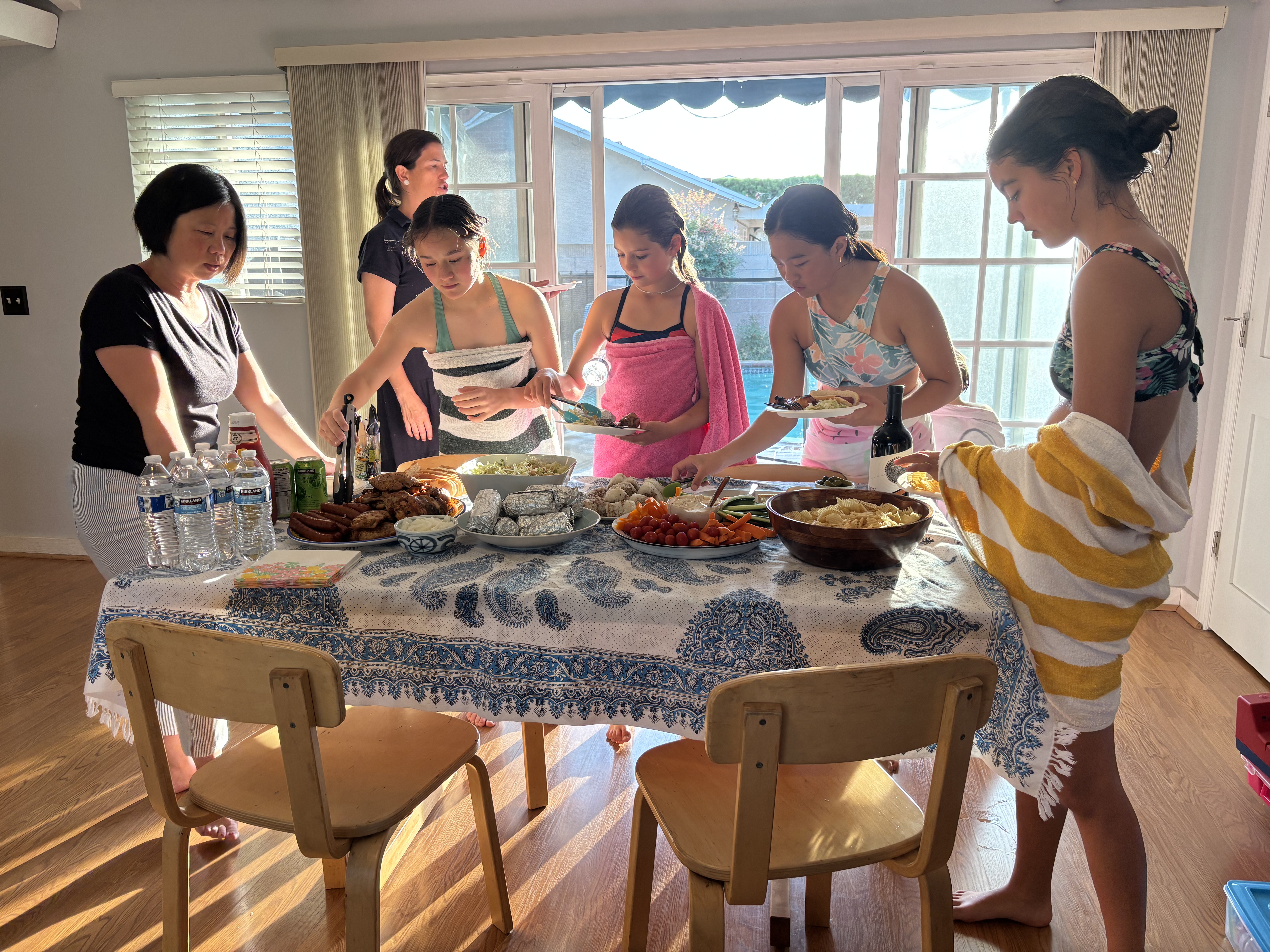 Img: dining room, dining table, table, chair, adult, female, person, woman, brunch, people