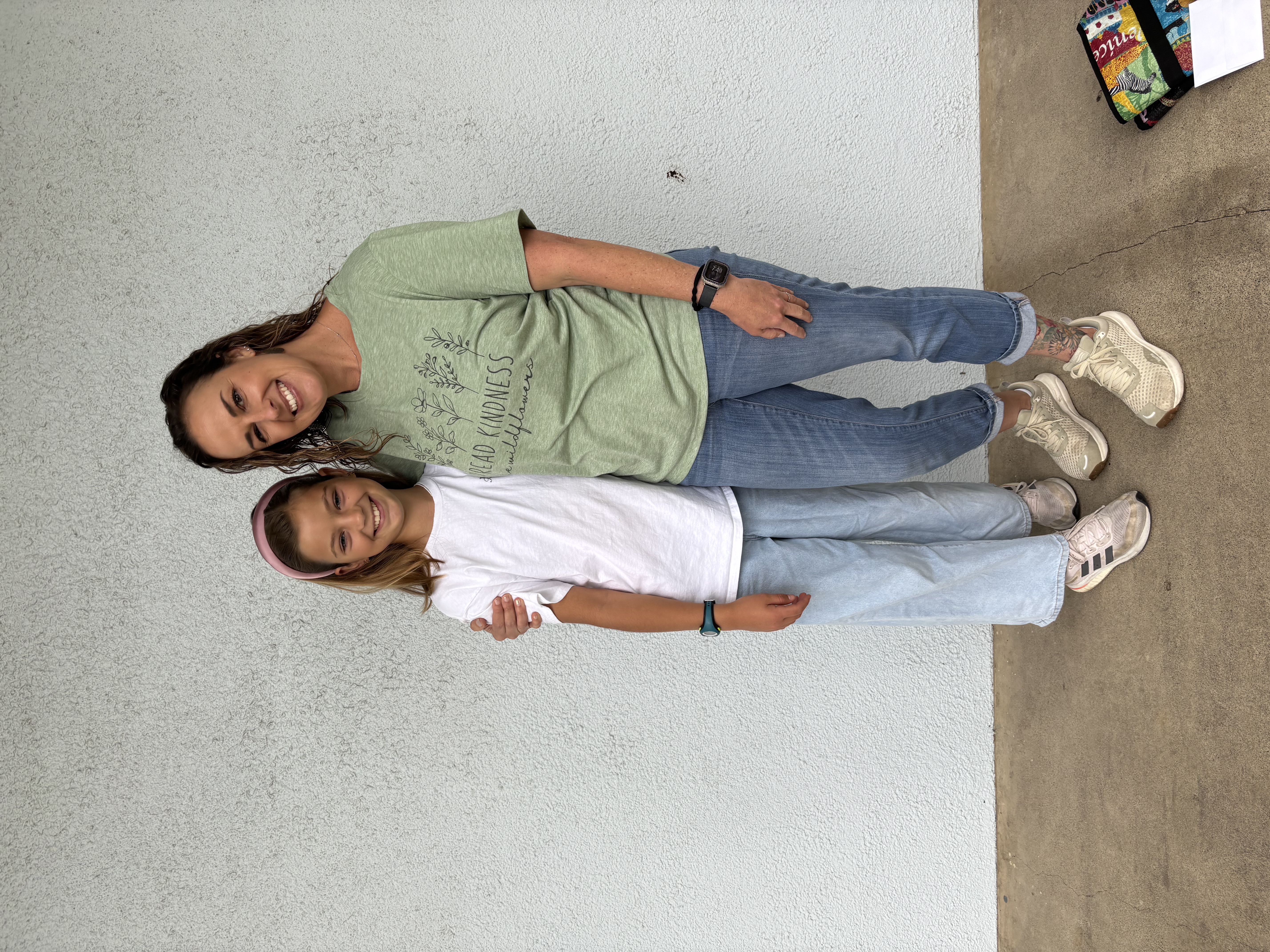 Img: clothing, pants, jeans, person, footwear, shoe, wristwatch, sleeve