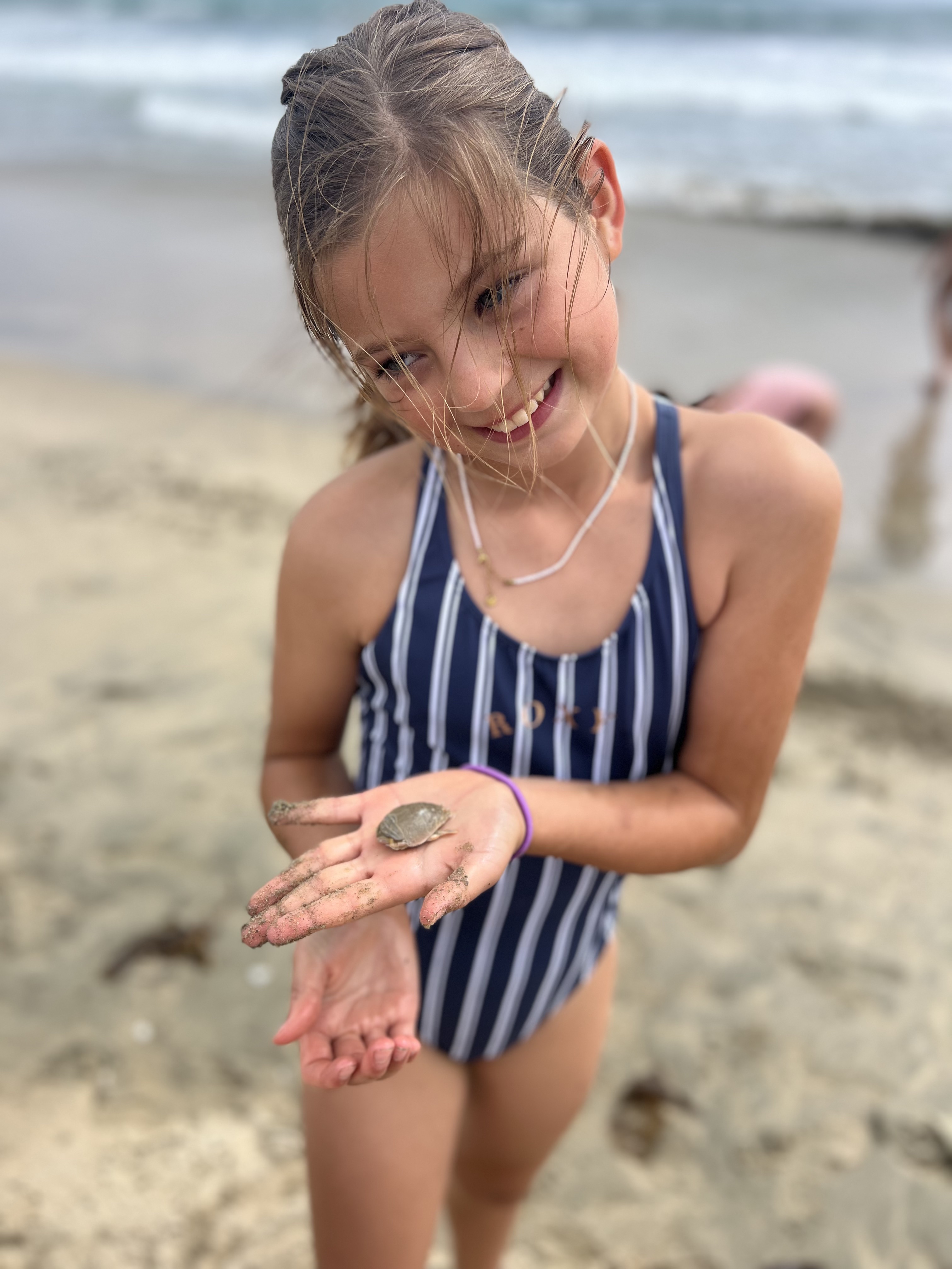 Img: child, female, girl, person, beach, necklace, bracelet, portrait, finger, swimwear