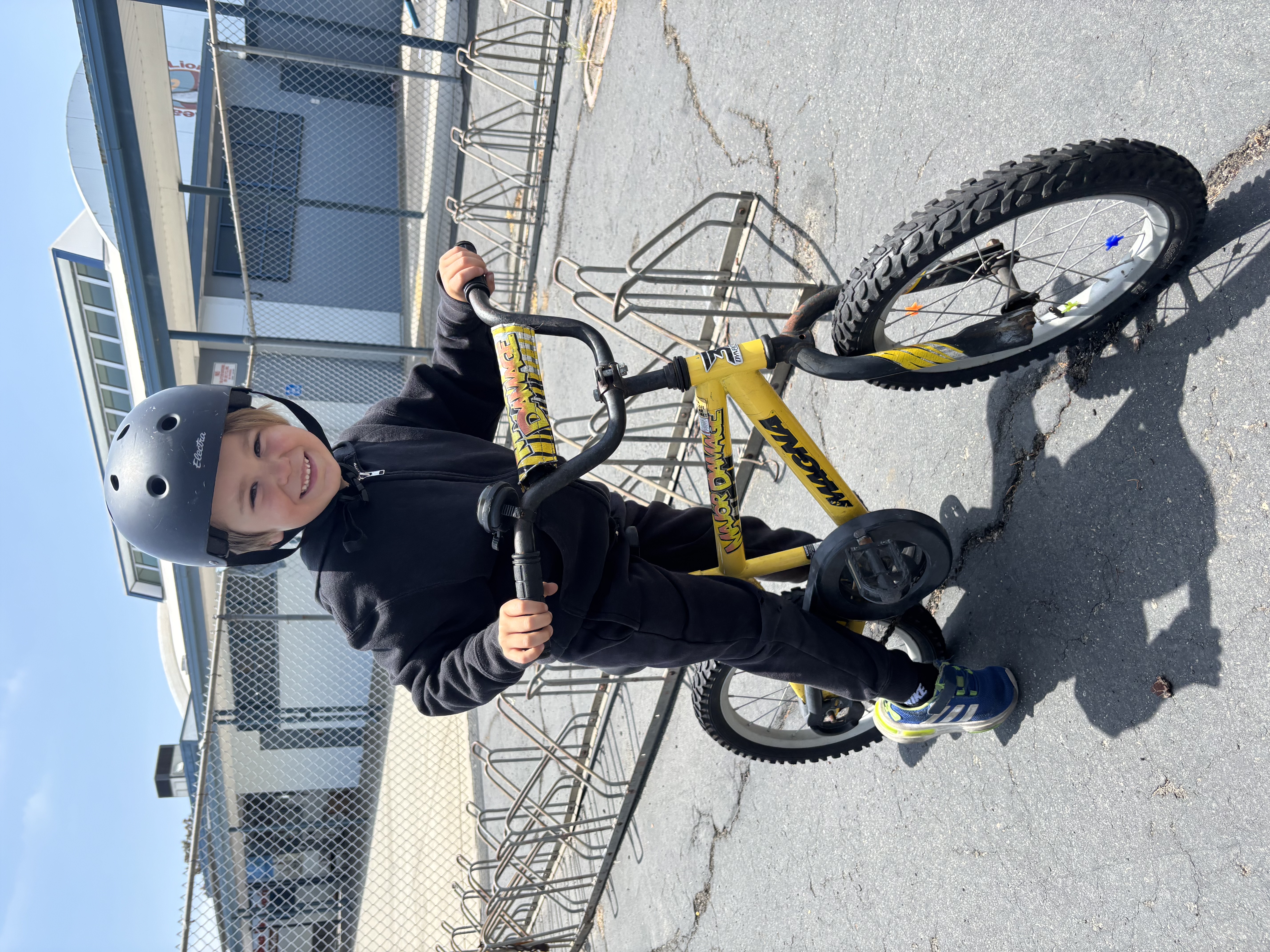Img: footwear, shoe, helmet, boy, child, male, person, bicycle, vehicle, cycling