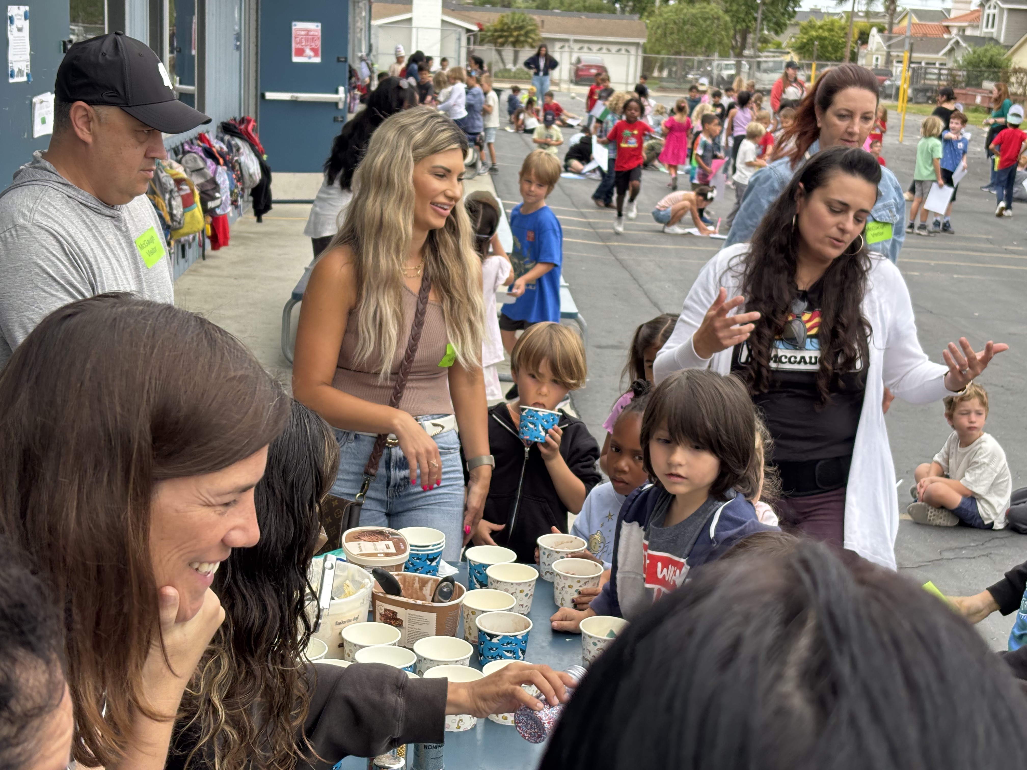 Img: people, person, hat, cup, shoe, adult, female, woman, city, man