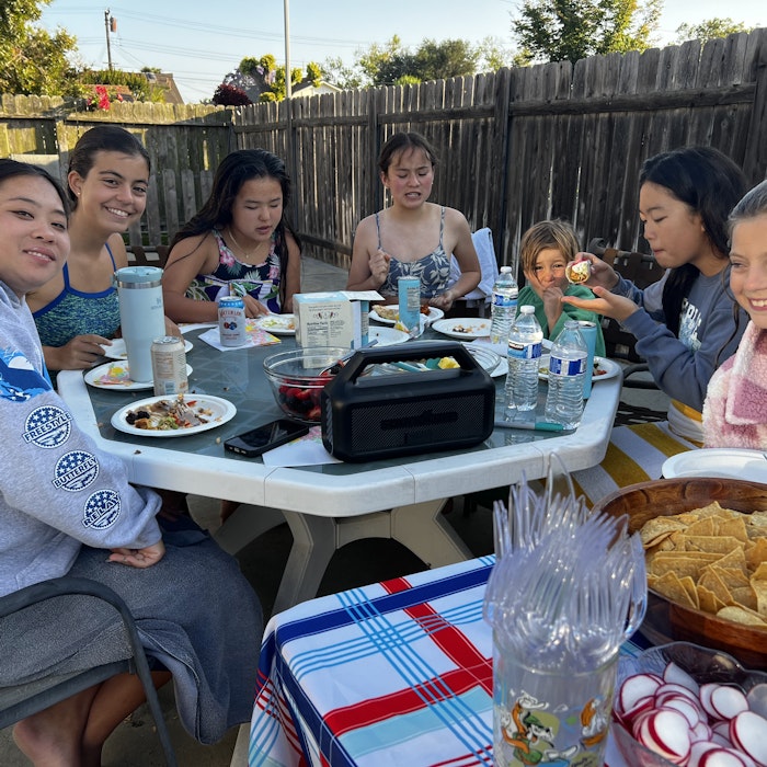 Img: lunch, meal, table, people, person, dining table, plate, mobile phone, brunch, child