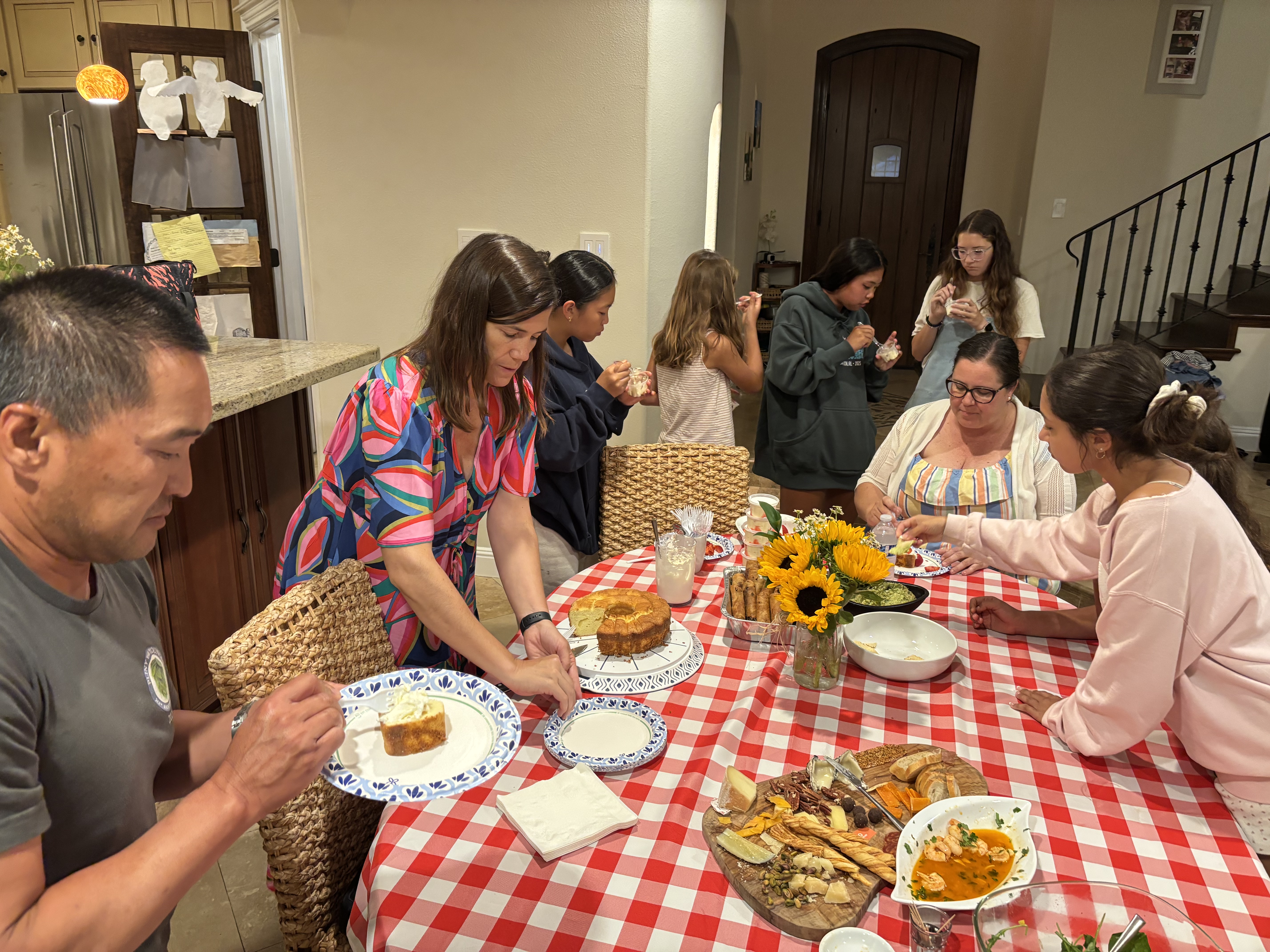 Img: brunch, adult, female, person, woman, plate, male, man, cup, dining table