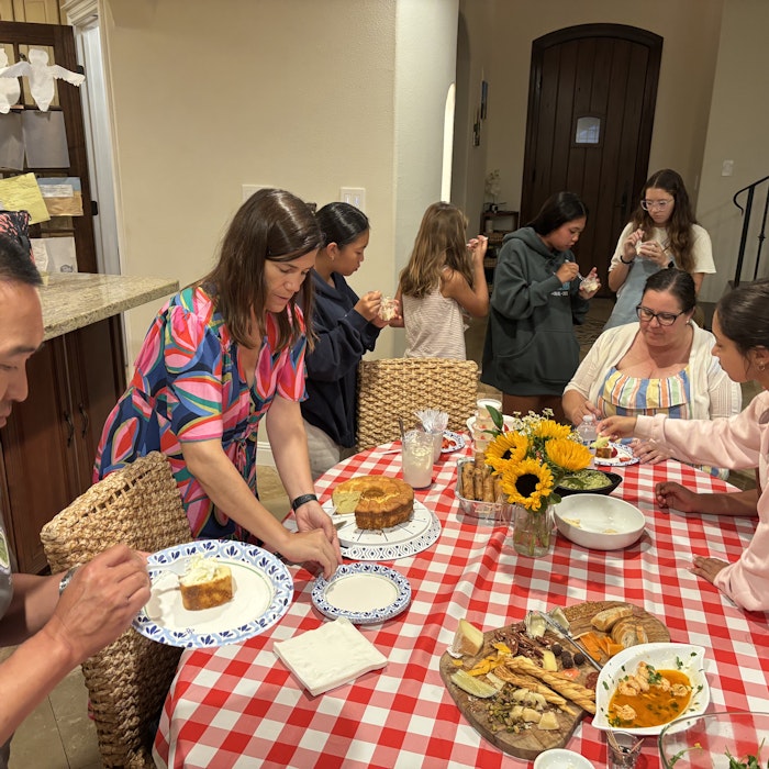Img: brunch, adult, female, person, woman, plate, male, man, cup, dining table