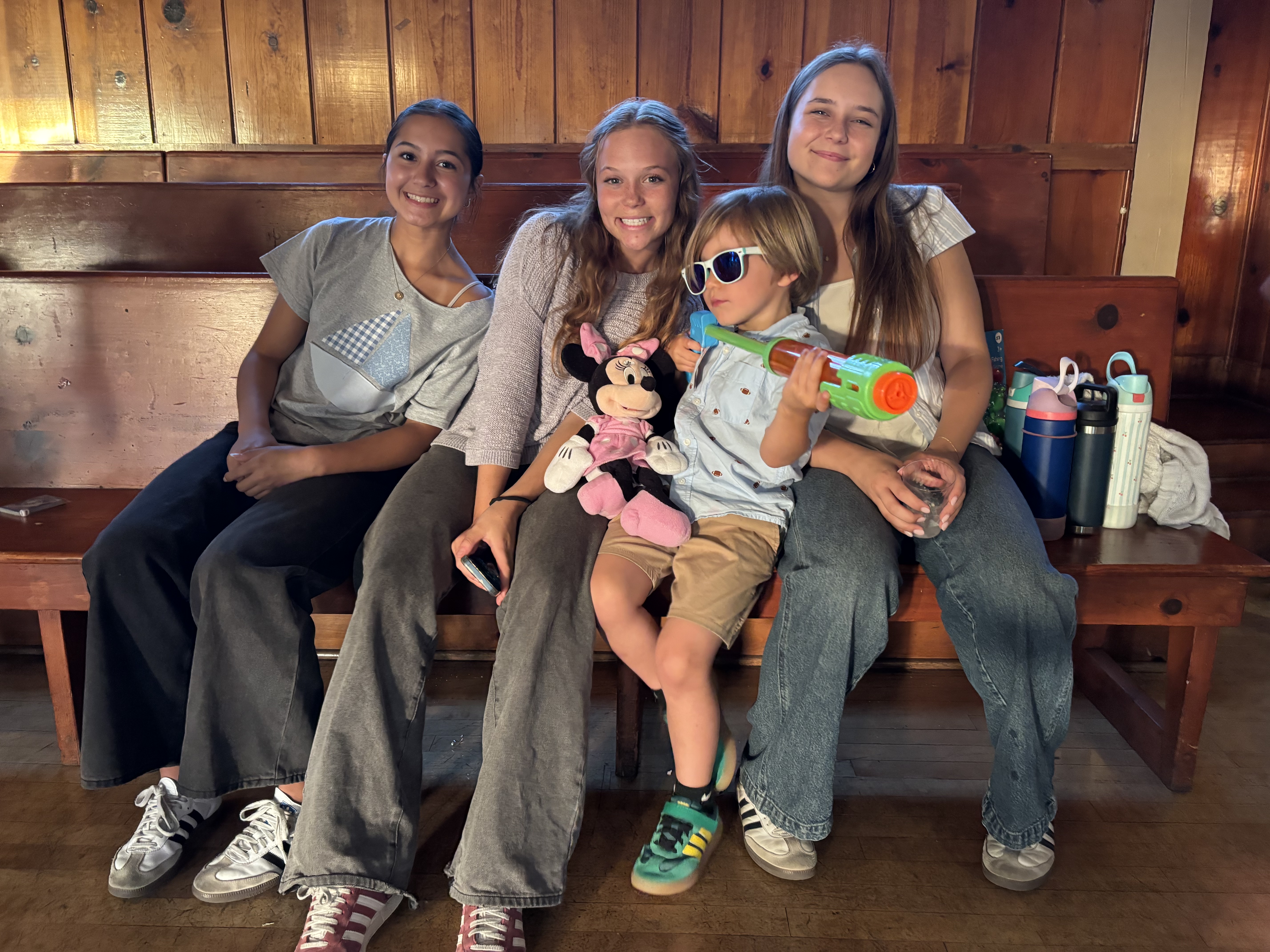 Img: people, person, pants, shoe, toy, glasses, photography, portrait, couch, mobile phone