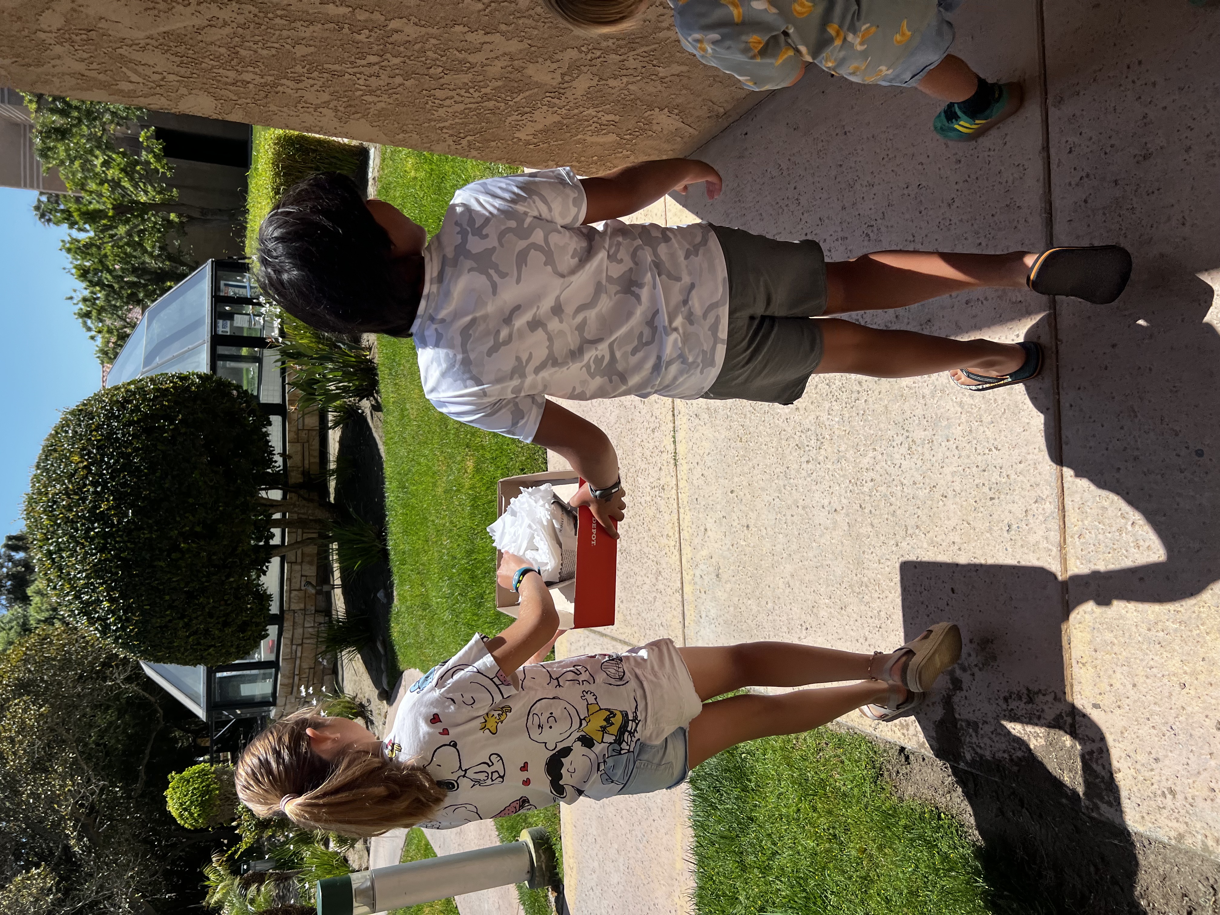 Img: shorts, shoe, boy, child, male, person, female, girl, hand, street