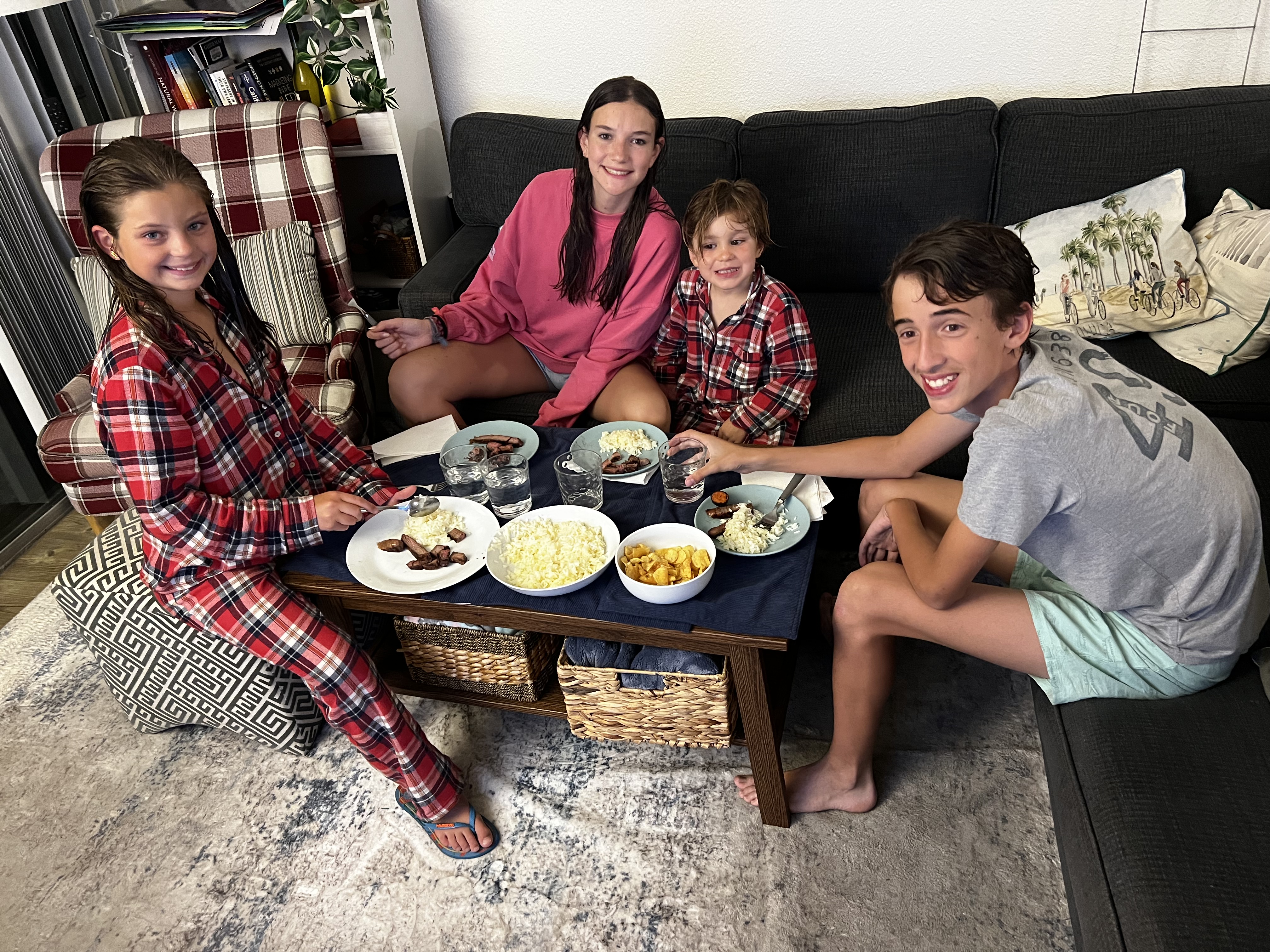 Img: couch, table, person, boy, male, teen, people, female, girl, plate