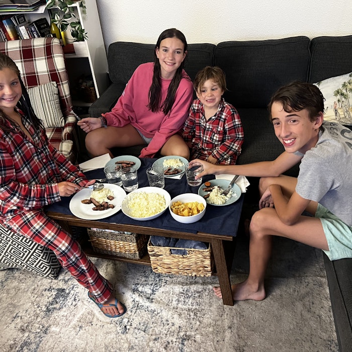 Img: couch, table, person, boy, male, teen, people, female, girl, plate