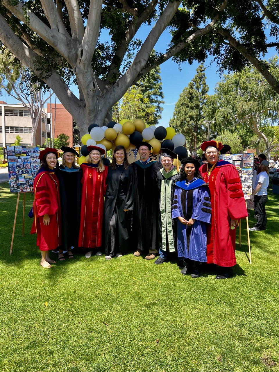 Img: people, person, adult, female, woman, hat, student, grass, shoe, tree