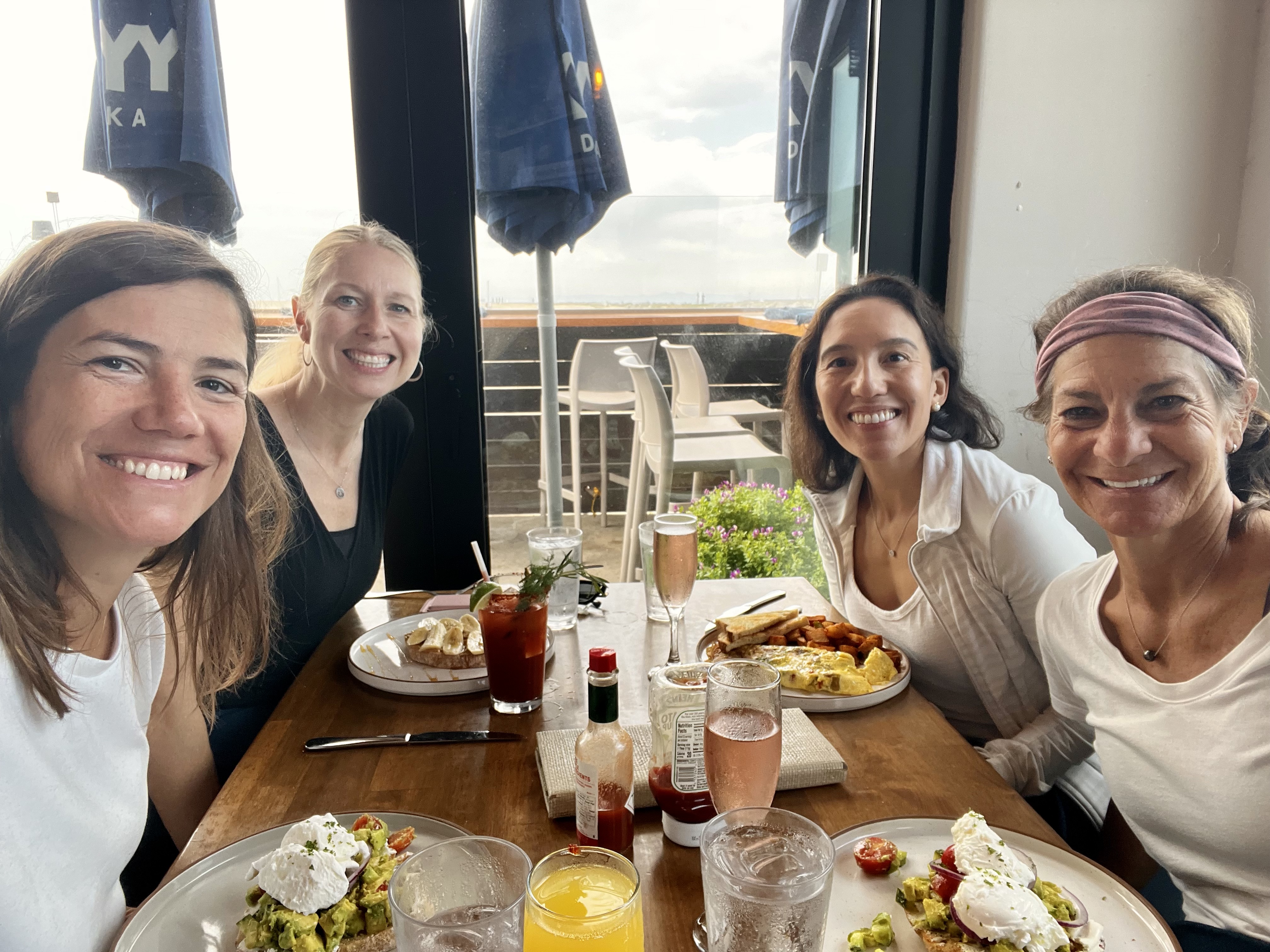 Img: brunch, lunch, cup, dining table, table, adult, female, person, woman, knife