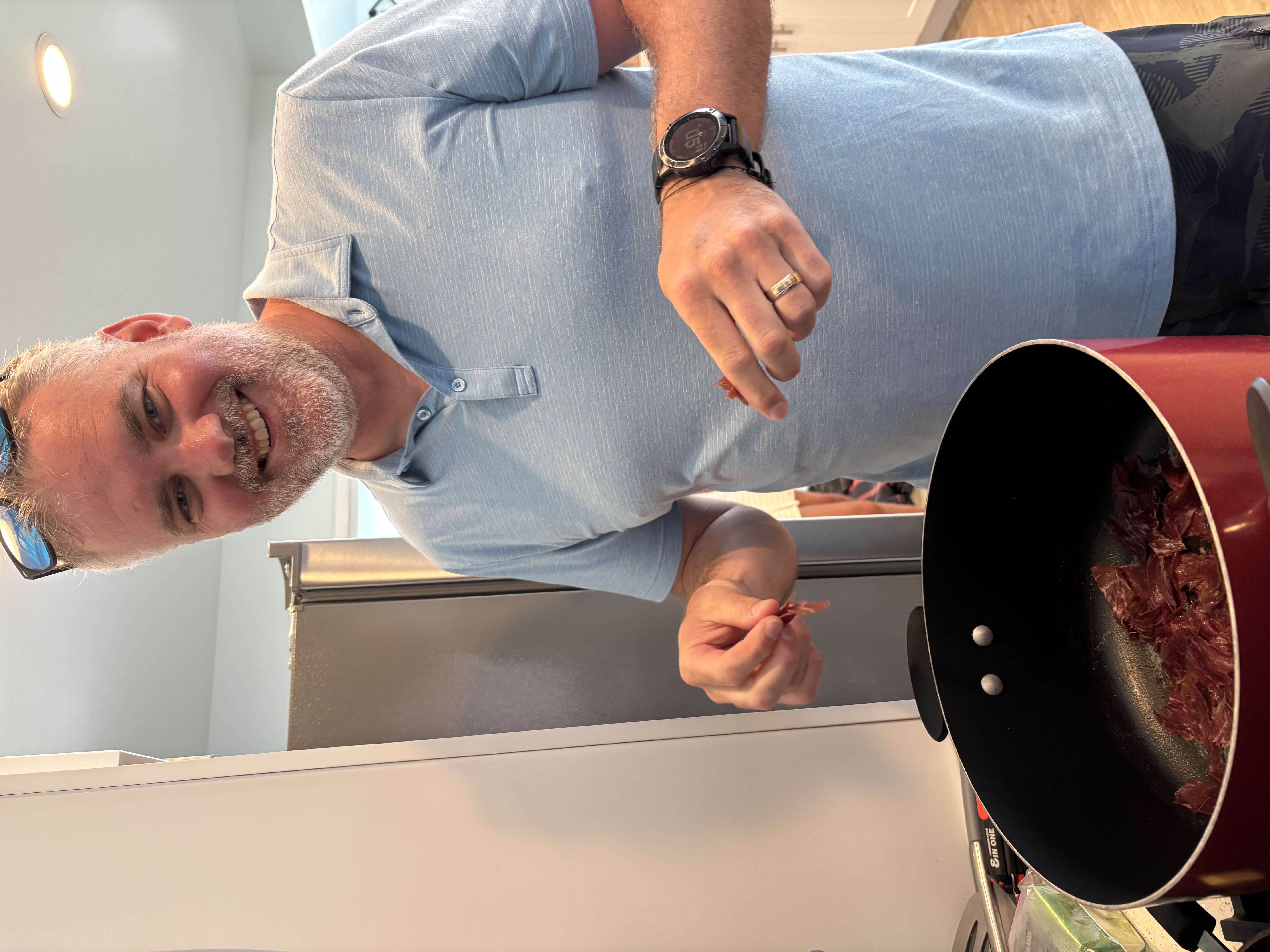 Img: ring, wristwatch, adult, male, man, person, cooking, stirring food, glasses, cooking pot