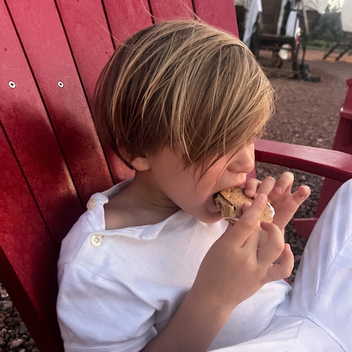 Img: person, head, face, burger, food, biting, eating