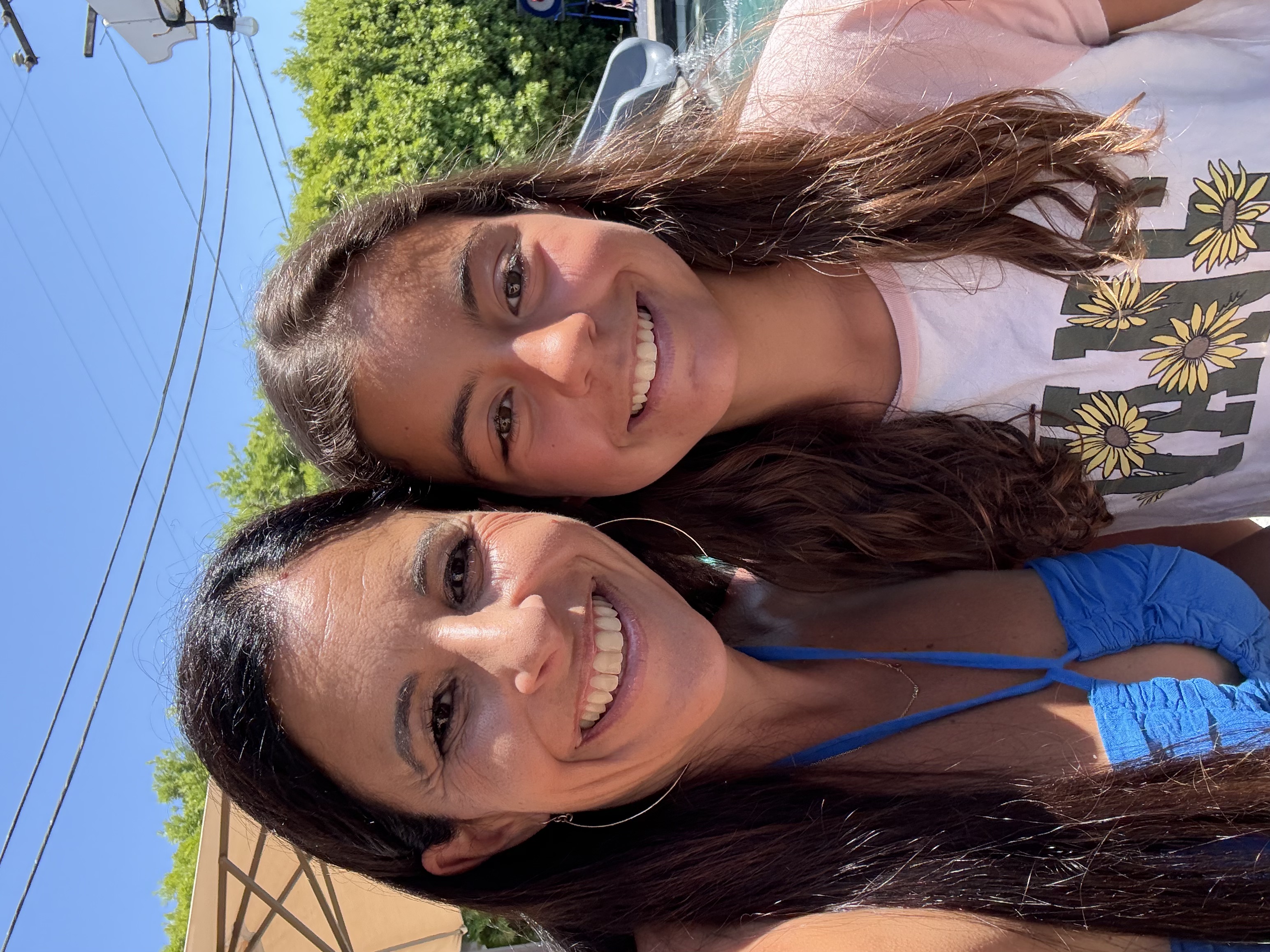 Img: female, girl, person, teen, face, head, smile, portrait, brown hair, necklace