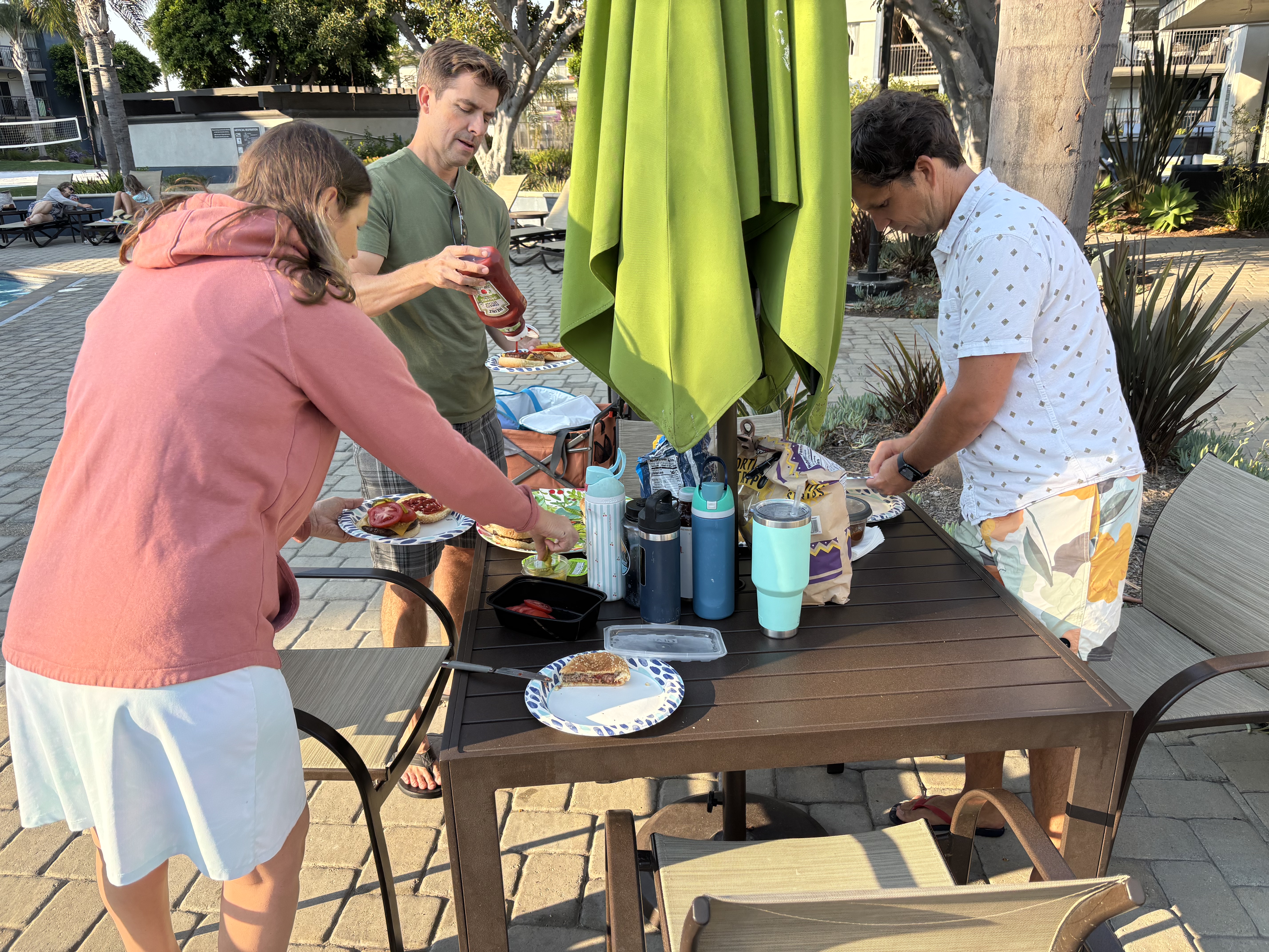 Img: table, dining table, adult, female, person, woman, male, man, plate, cup