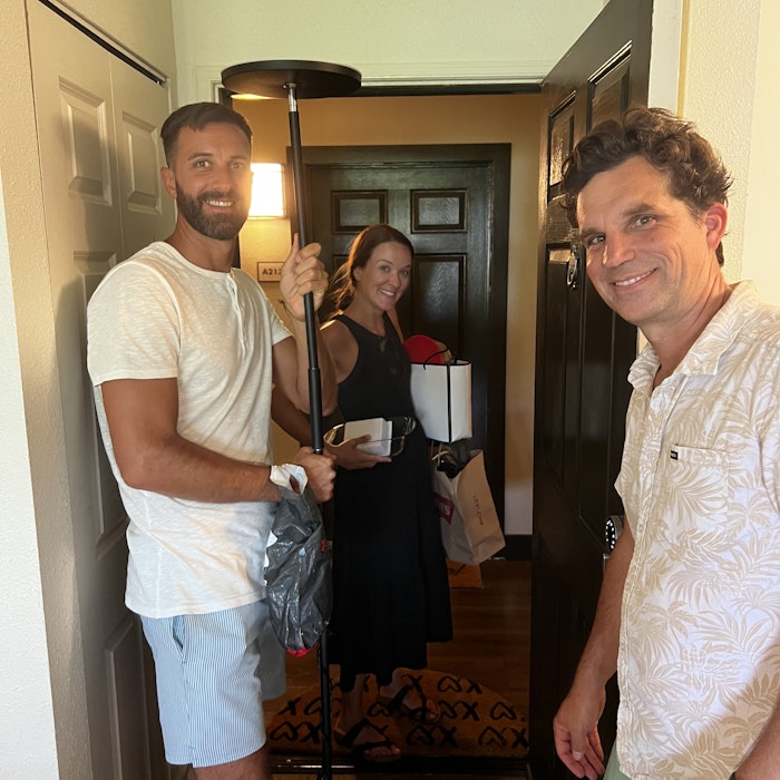 Img: lamp, adult, male, man, person, door, shorts, female, woman, handbag