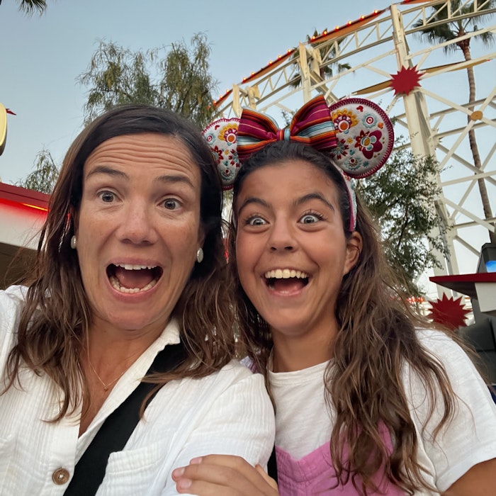 Img: face, head, person, photography, portrait, adult, female, woman, amusement park, blouse