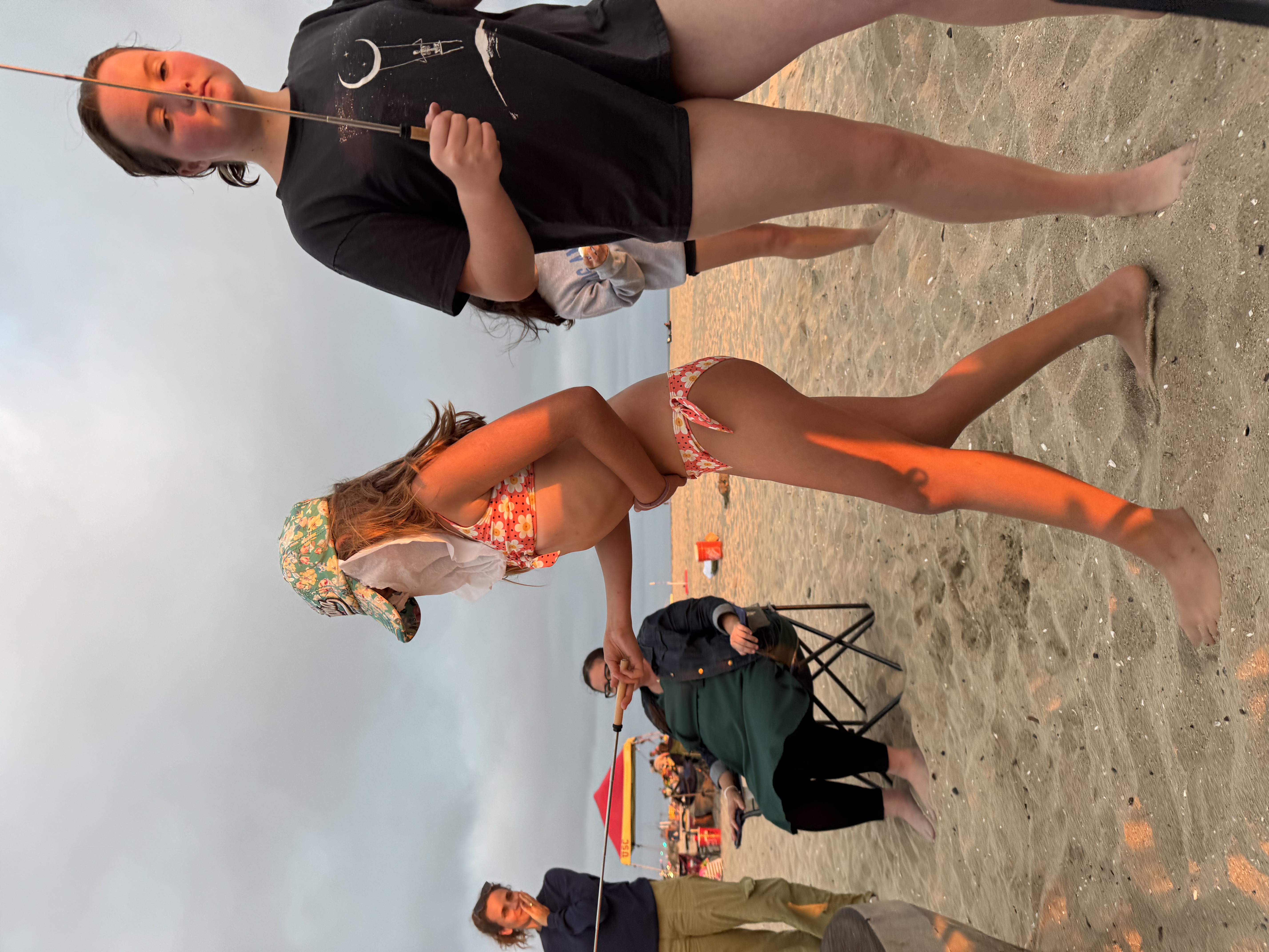 Img: adult, female, person, woman, swimwear, male, man, hat, chair, beachwear