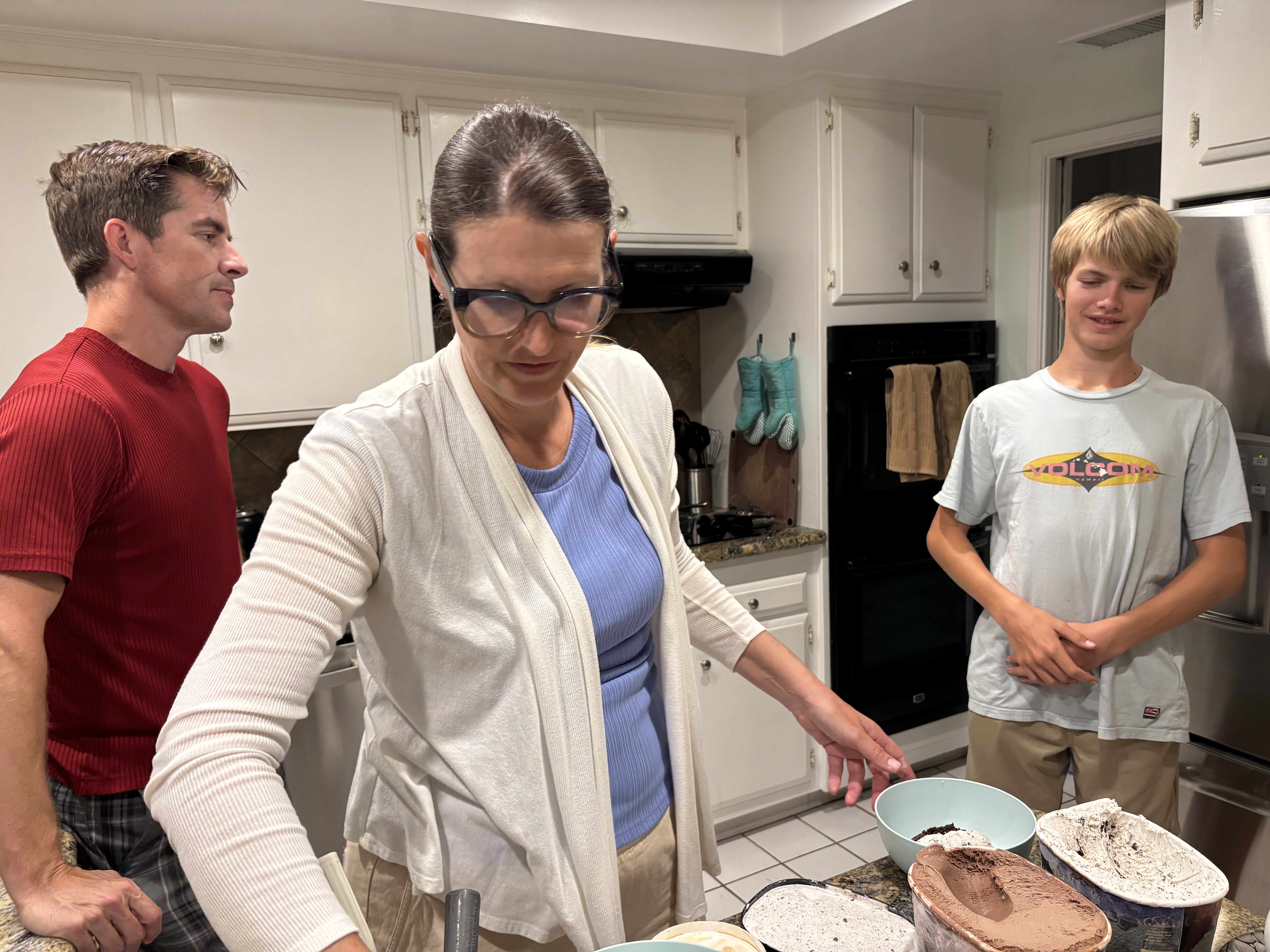 Img: boy, male, person, teen, adult, female, woman, glasses, people, stirring food