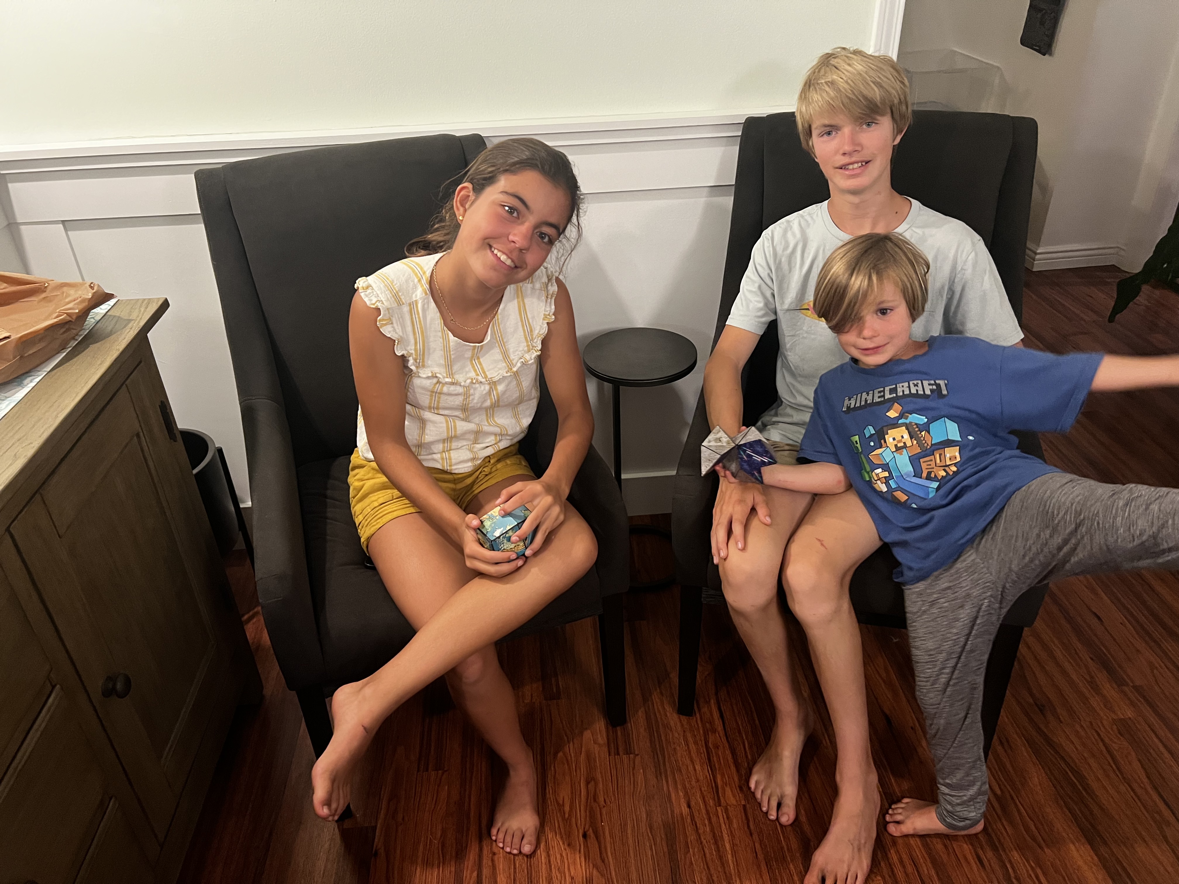 Img: couch, people, person, barefoot, t-shirt, wood, photography, portrait, blouse, living room