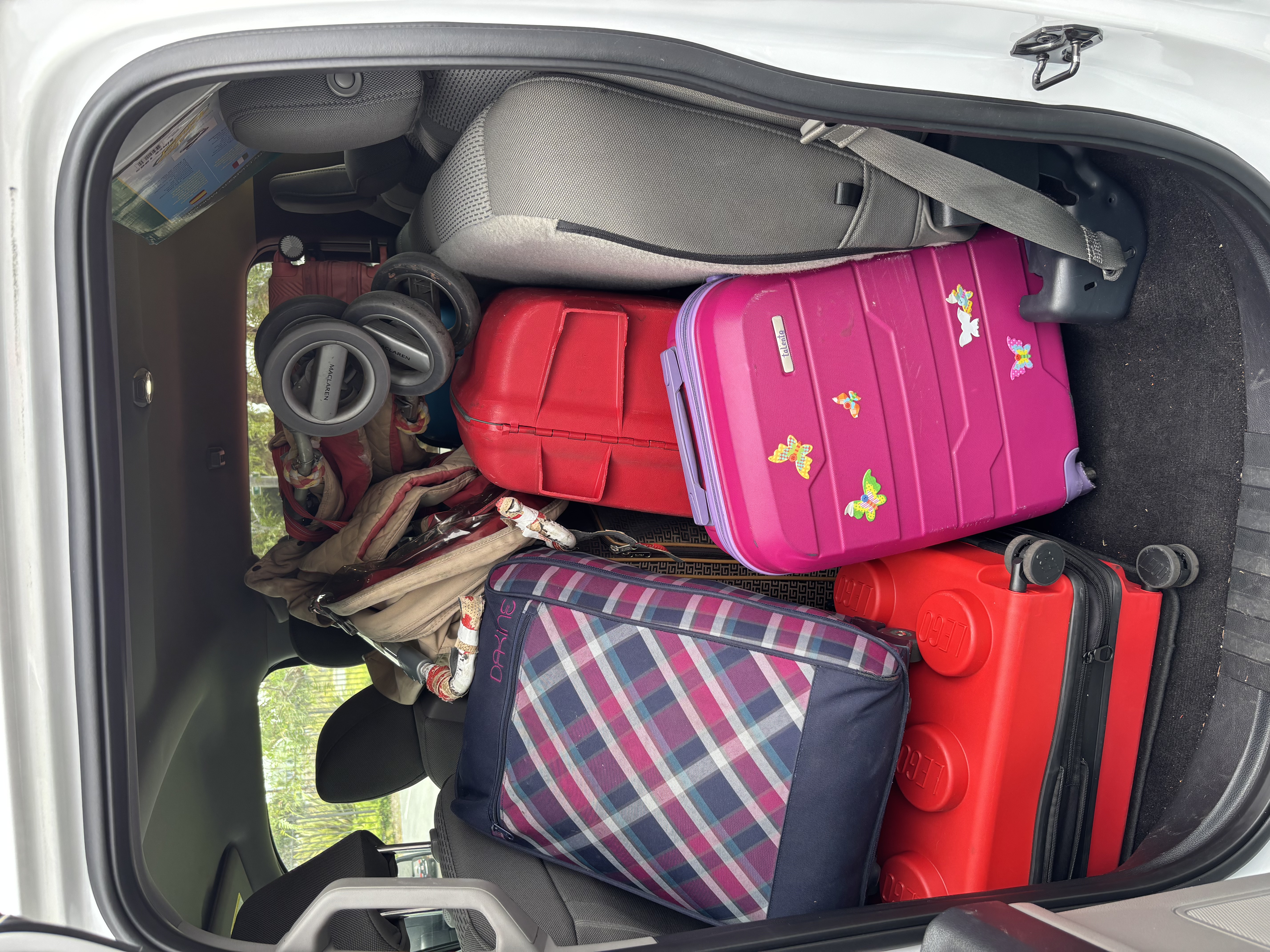 Img: baggage, chair, furniture, car, transportation, vehicle