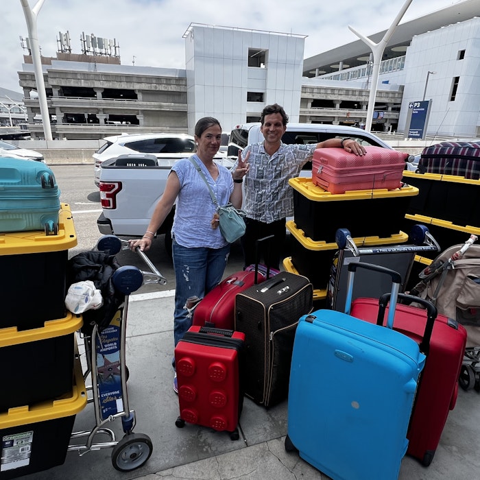 Img: bag, handbag, baggage, adult, male, man, person, box, car, suitcase