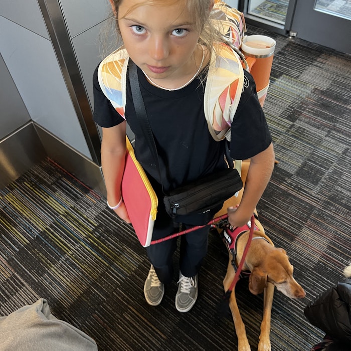 Img: child, female, girl, person, footwear, shoe, cup, bag, handbag, dog