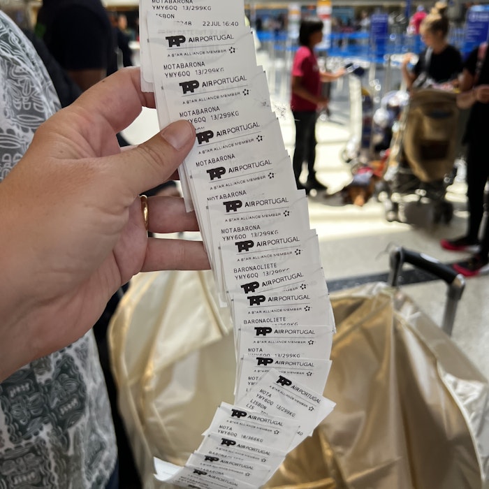Img: document, receipt, text, person, adult, male, man, bag, handbag, shoe