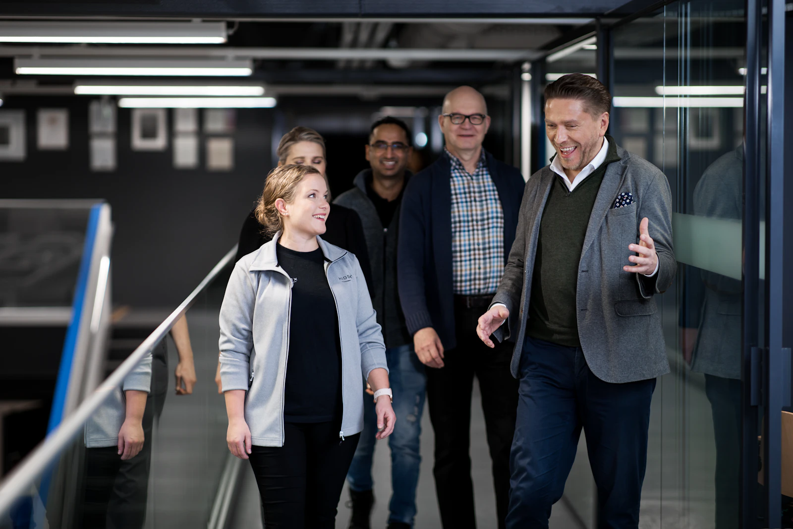 Hidex colleagues walking together in Turku office
