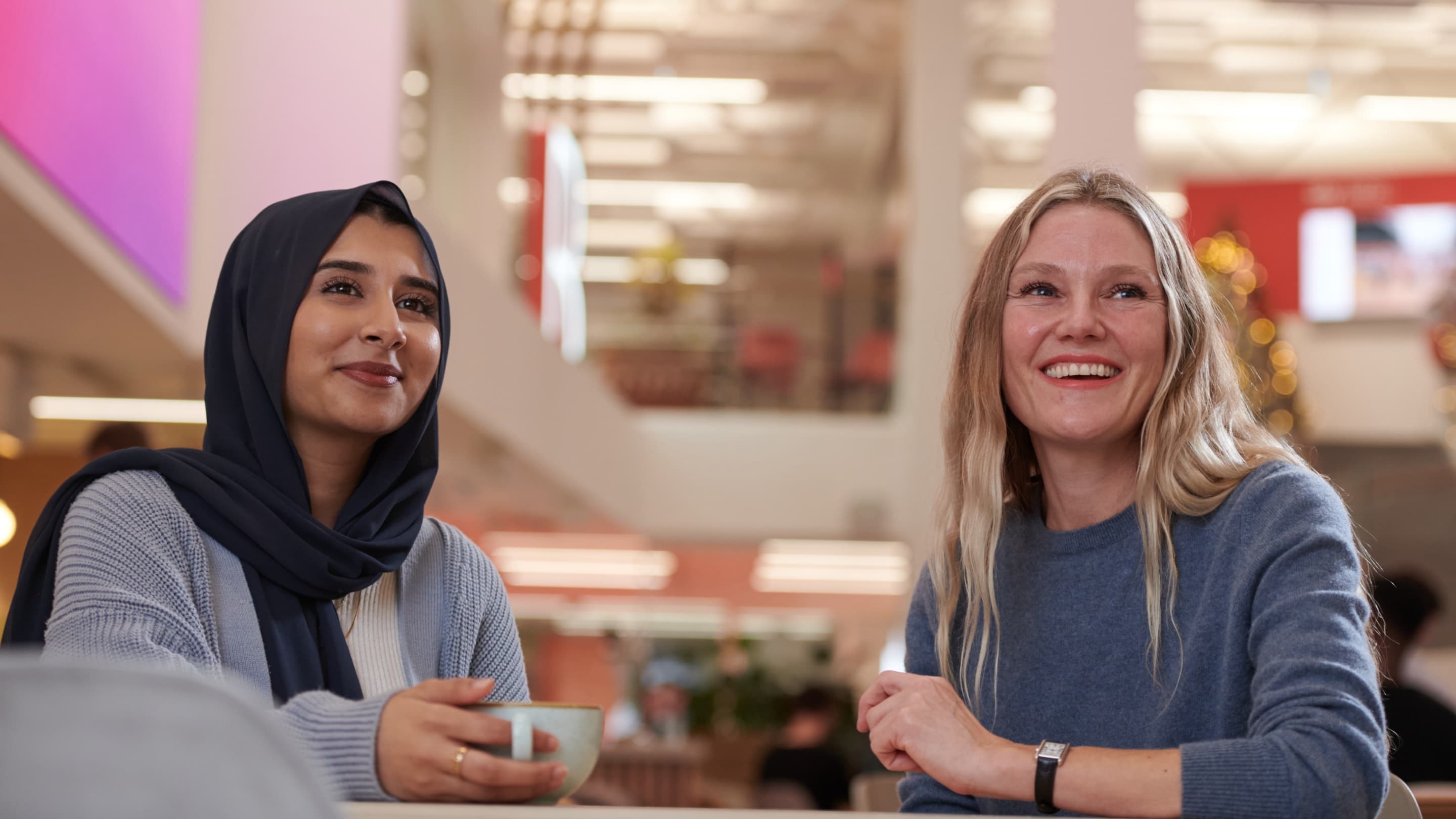 Two women smiling