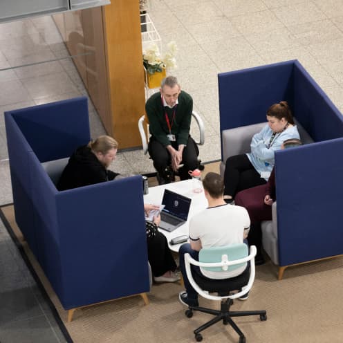 group of people having a meeting together