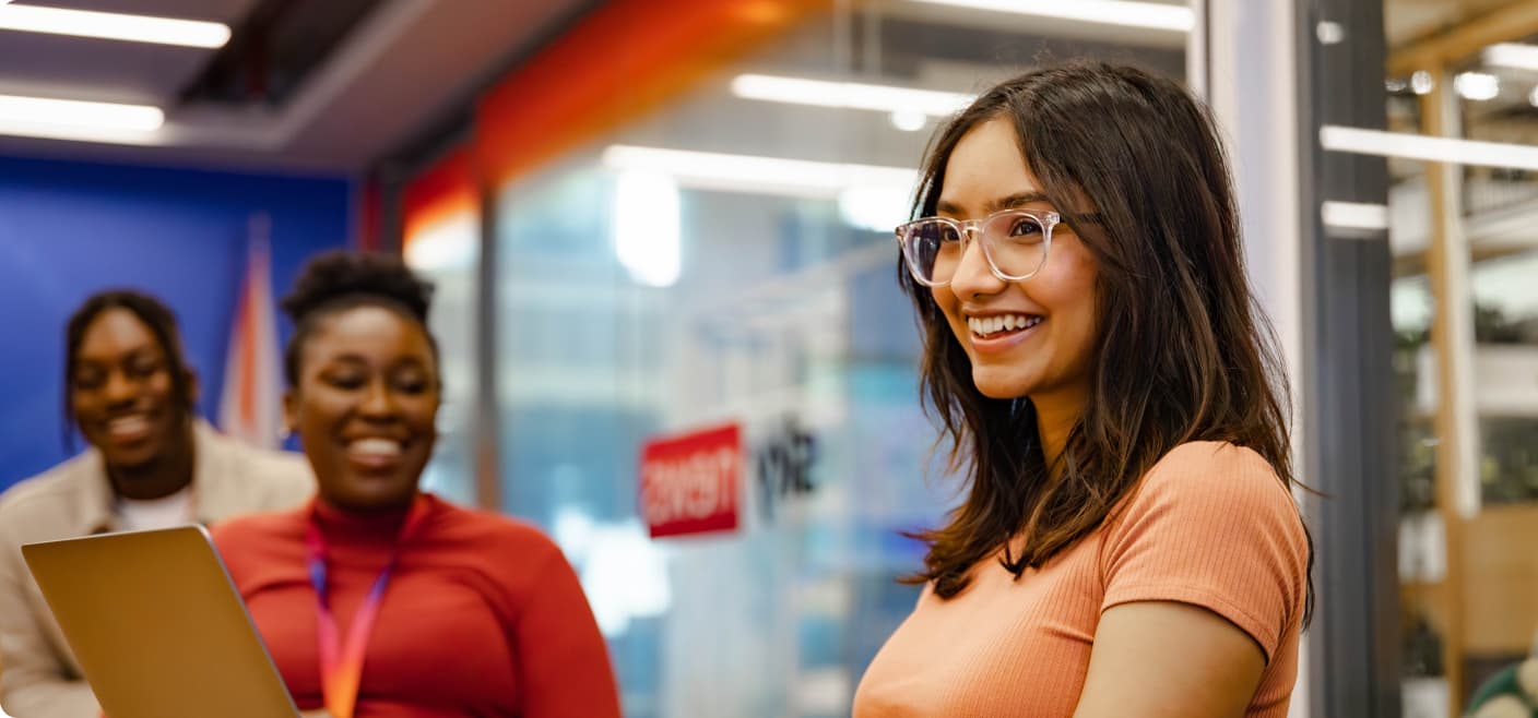 People in the office smiling