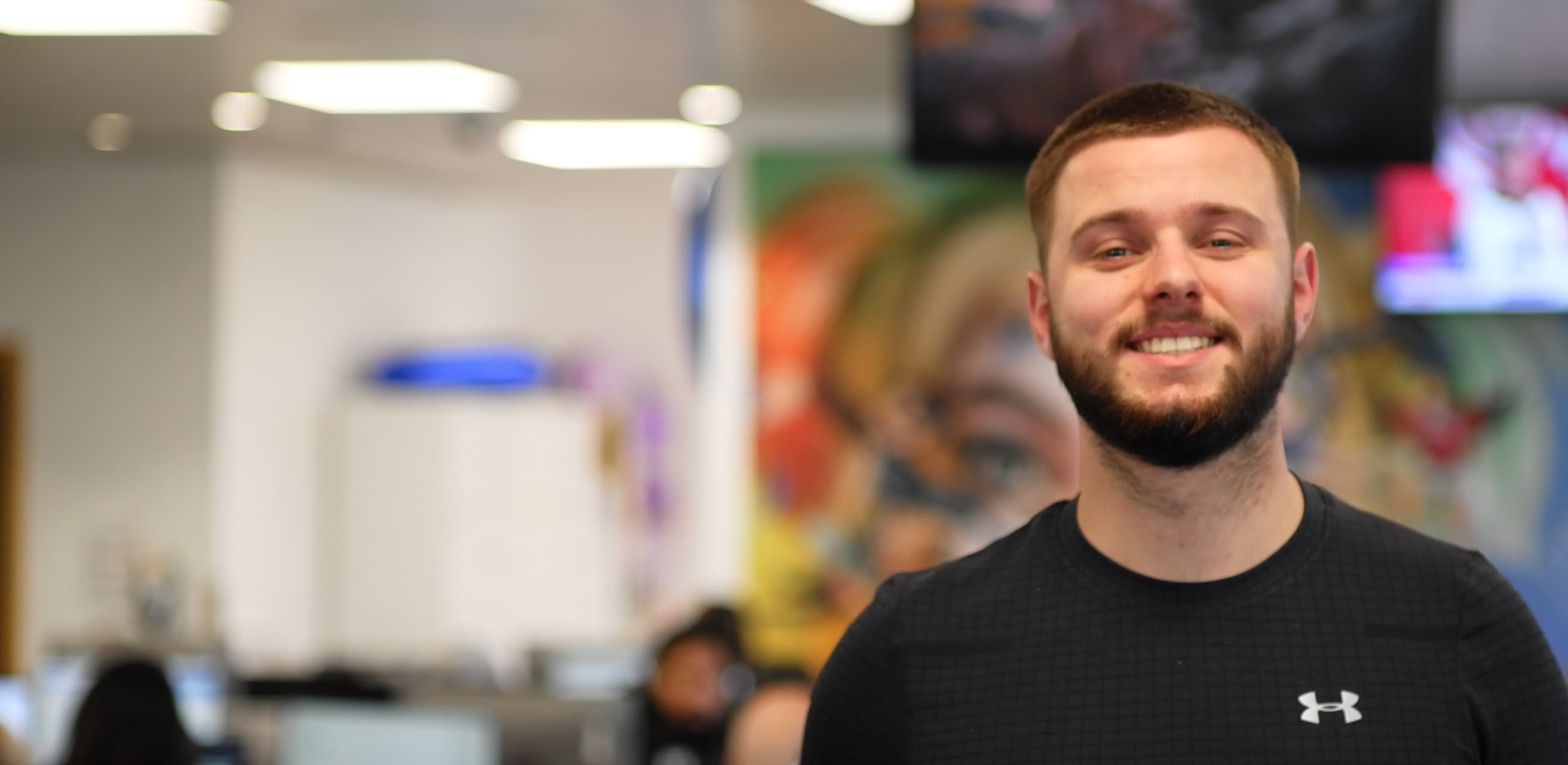 a young man in a black t-shirt