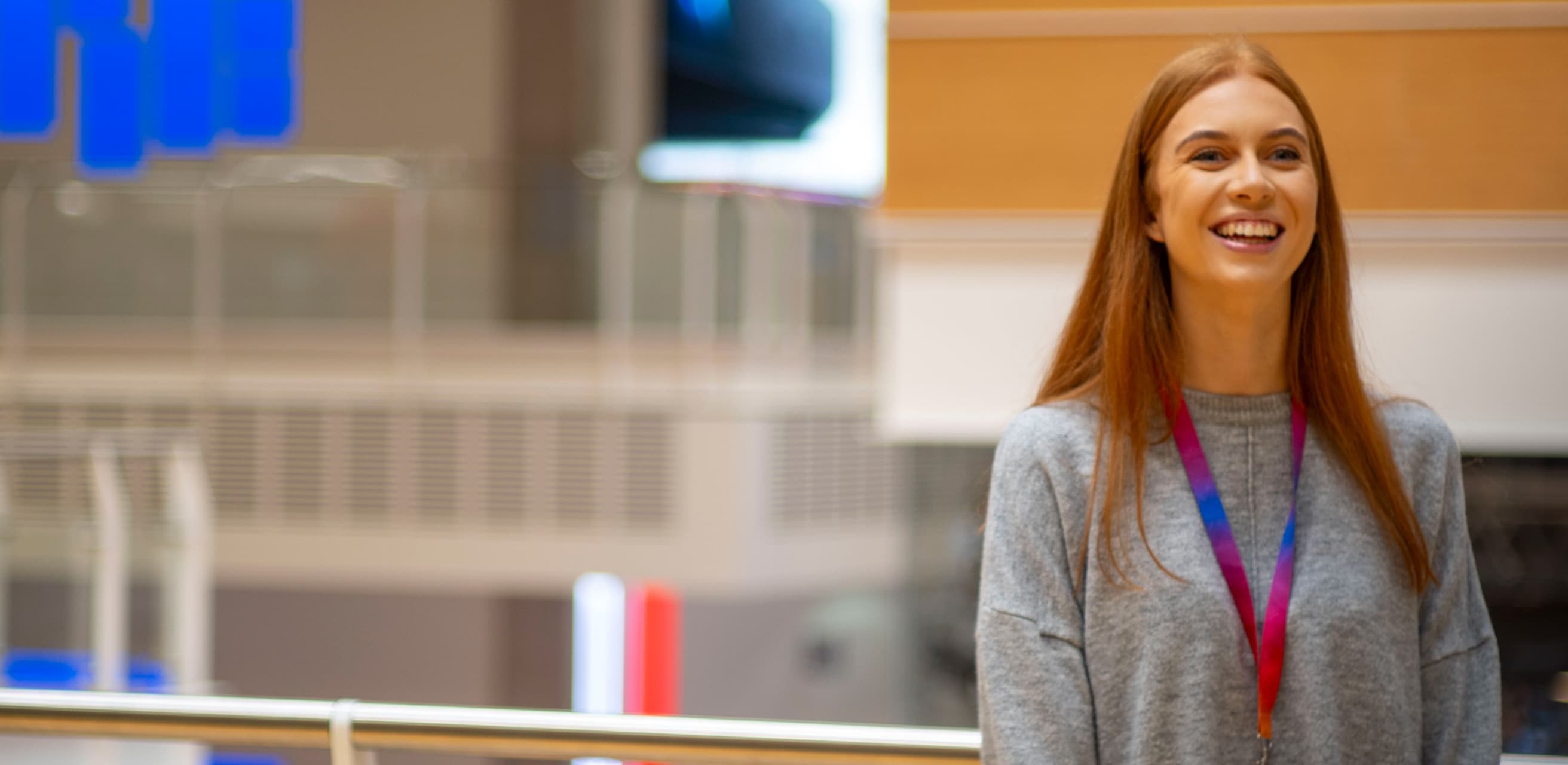woman with red hair smiling