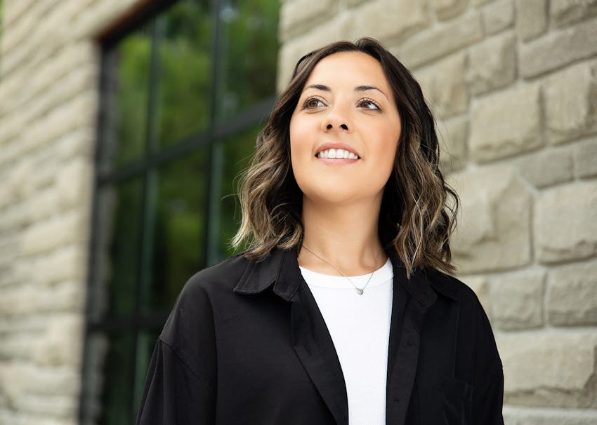 Woman smiling and looking outward