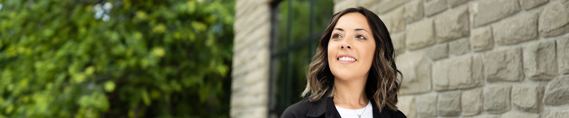 Woman smiling and looking up