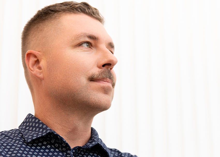 Dr. Brace Examining patient's nose