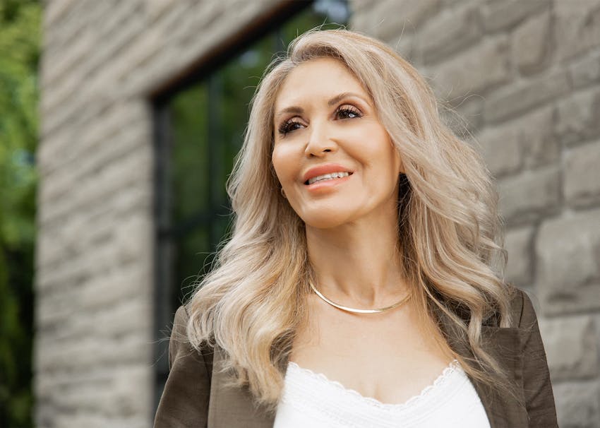 Woman smiling and looking outward