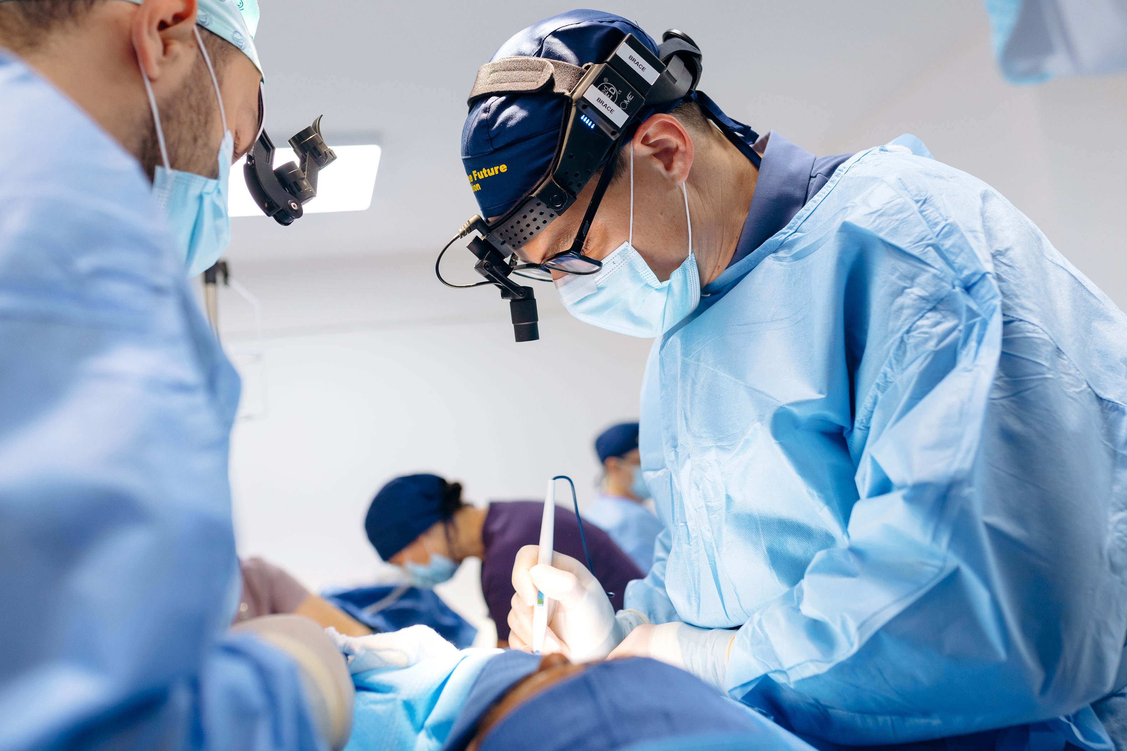 Dr. Brace performing surgery
