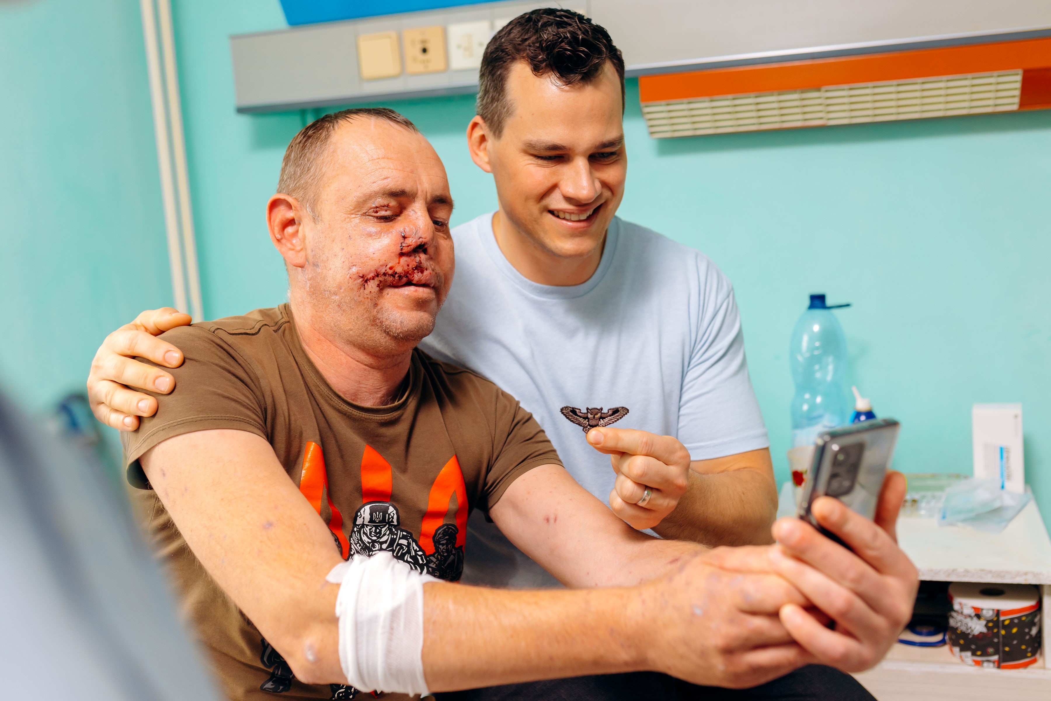 Dr. Brace smiling with patient
