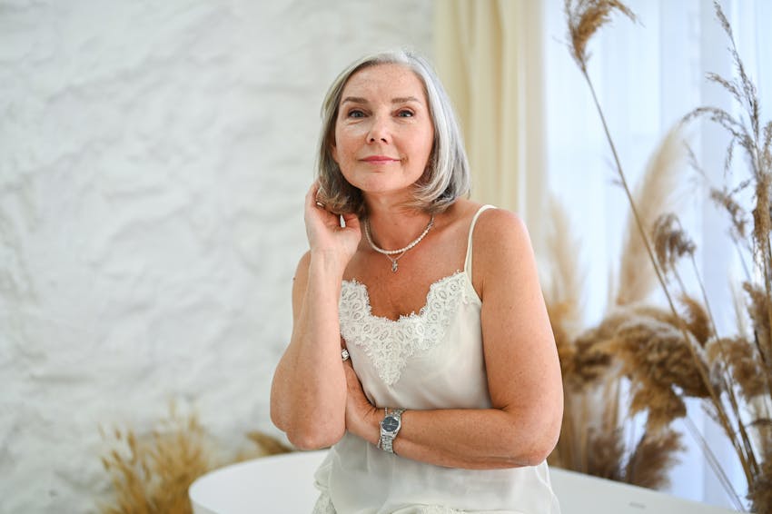 woman wearing a white blouse