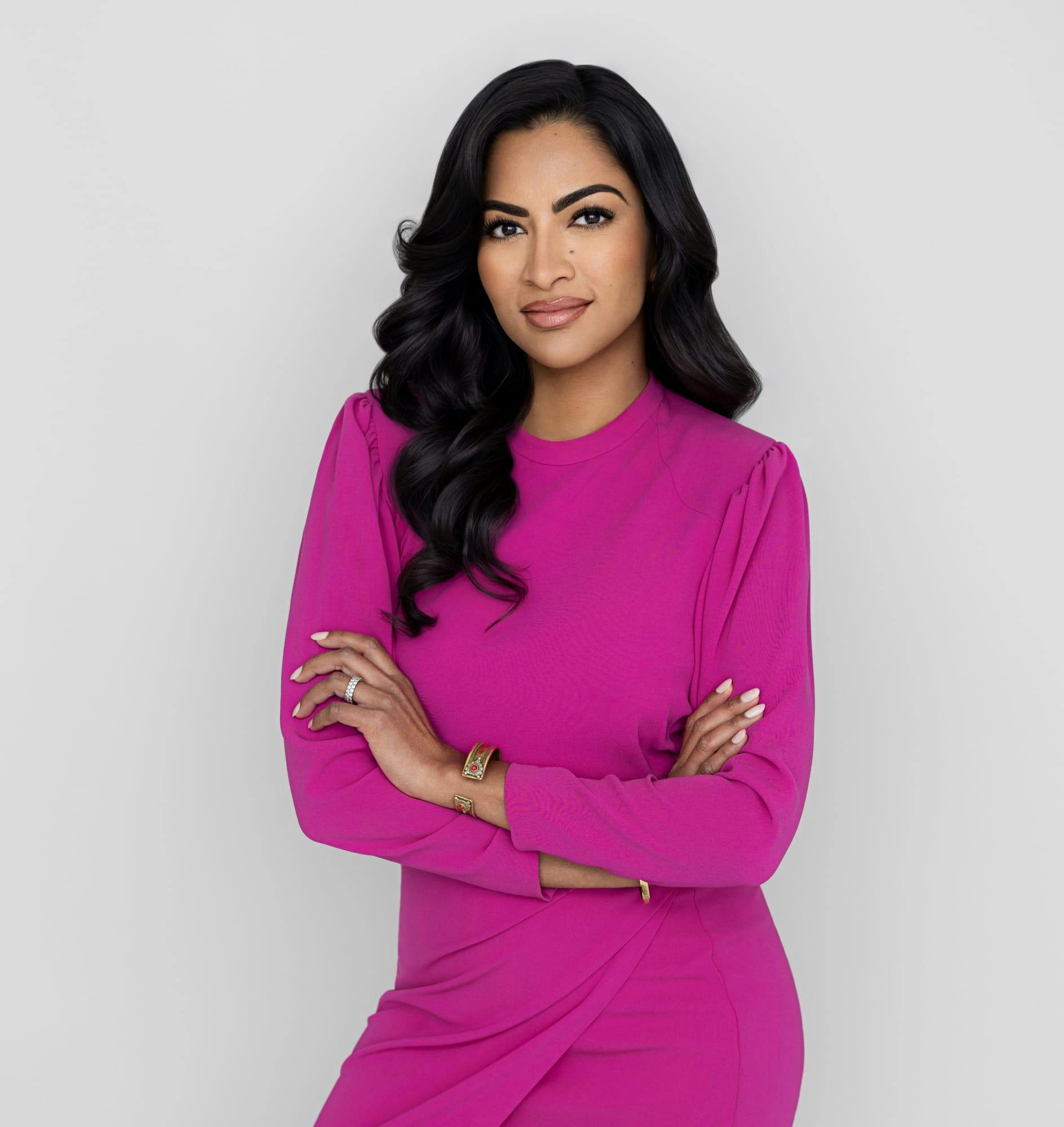 Dr. Sunder in a magenta dress