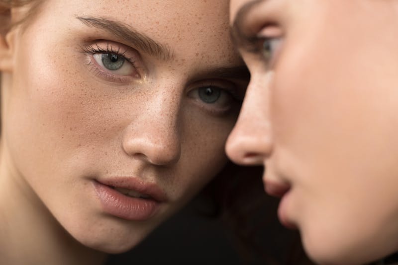 Woman looking in a mirror
